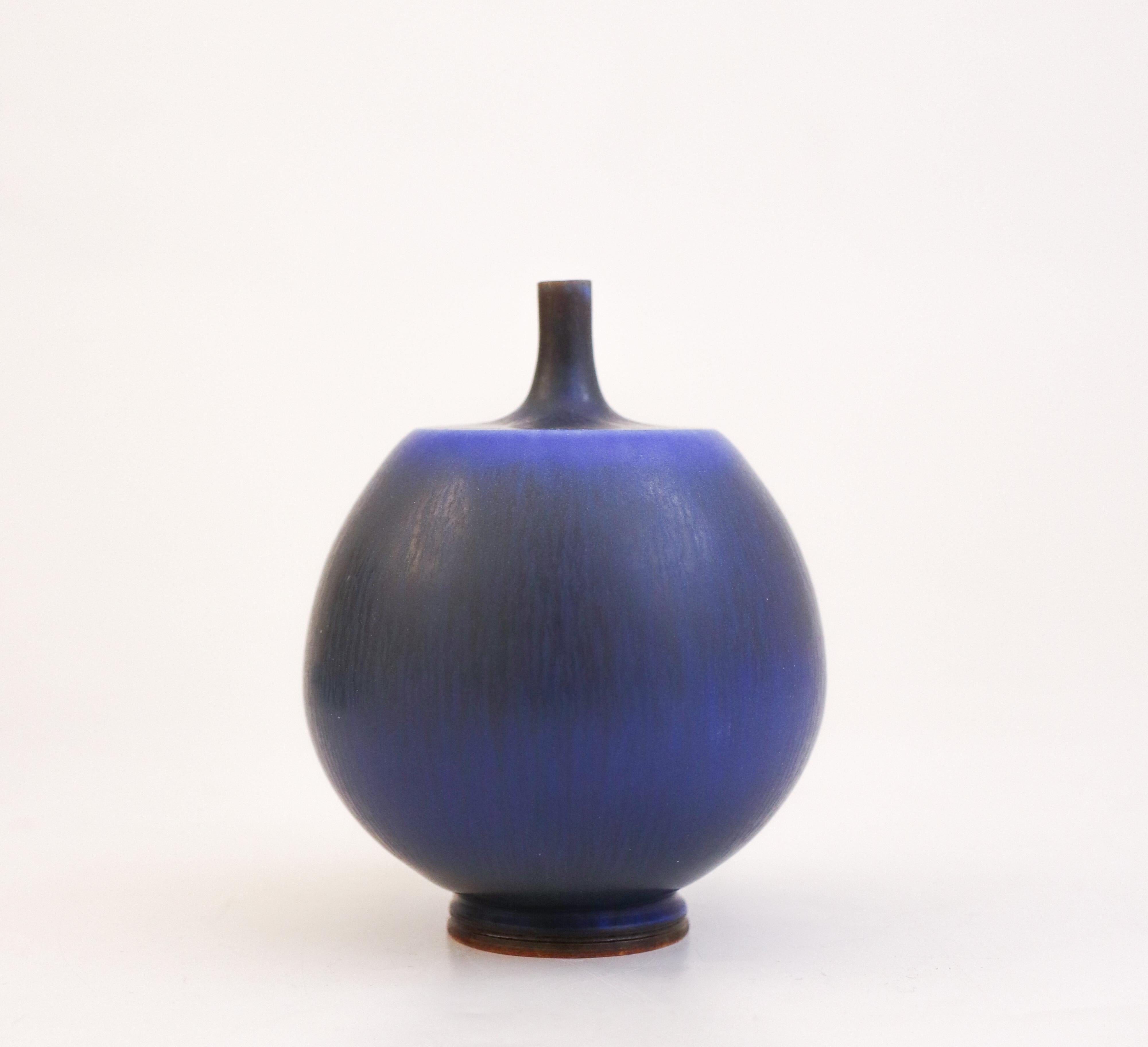 A deep blue vase designed by Berndt Friberg at Gustavsberg in Stockholm, the vase is 9.5 cm (3.8