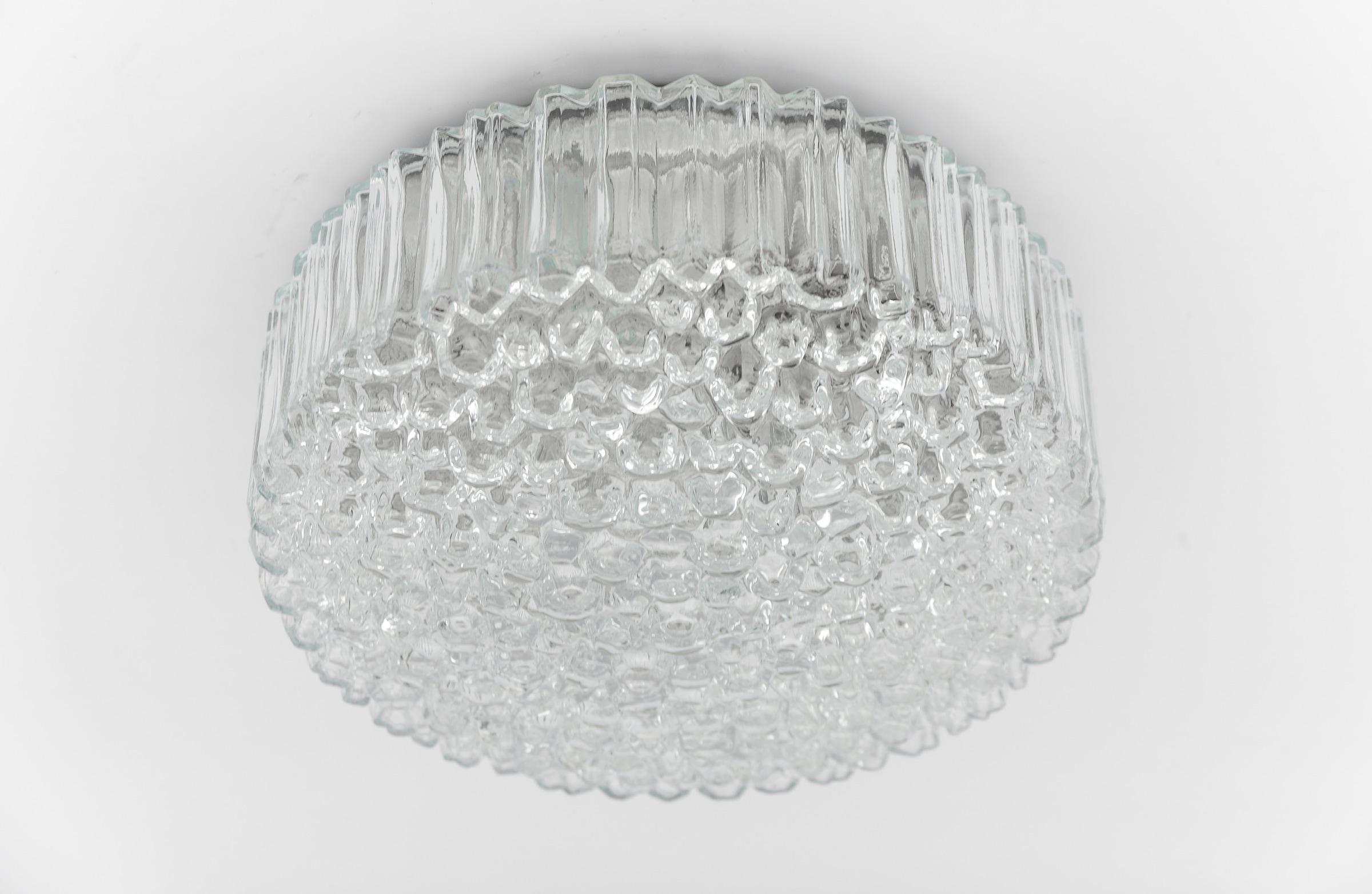 Lovely Bubble Glass Flush Mount Lamp by Helena Tynell for Limburg, Germany, 1960s

Each fixture need 1 x E27 standard bulb with 60W max.

Light bulbs are not included. 

It is possible to install this fixture in all countries (US, Australia, Asia,