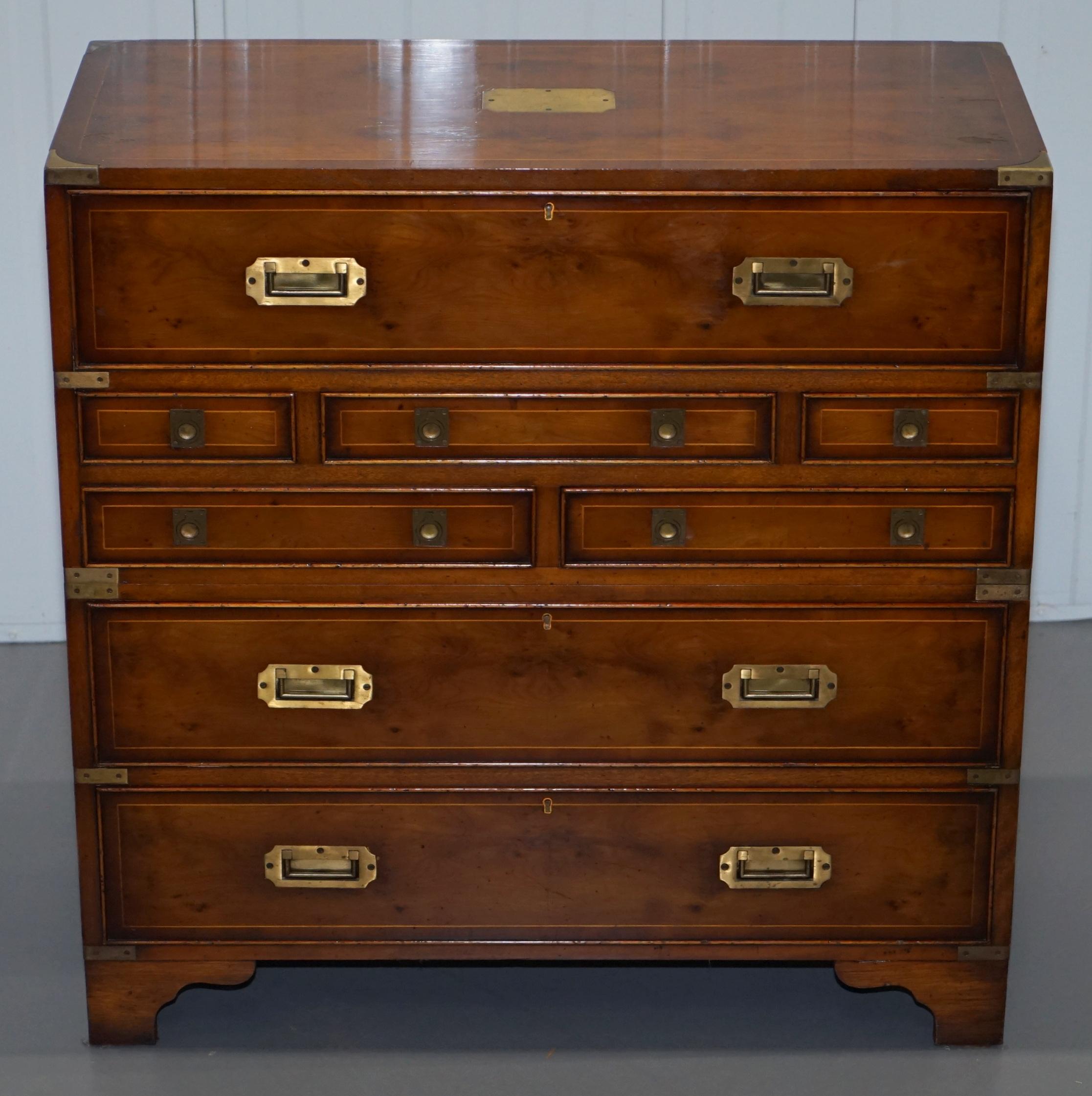 We are delighted to offer for sale this stunning antique Burr Yew wood military campaign chest of drawers with drop front secrataire desk and green leather writing surface 

A good looking and well made chest of drawers with convenient desk in