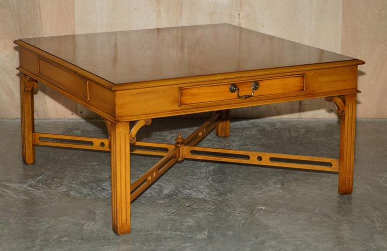 We are delighted to offer for sale this lovely condition, Burr Yew Wood, twin drawers coffee table with fretwork carved Thomas Chippendale style stretchers 

This is a very well made and versatile piece with a timber patina to die for. The table