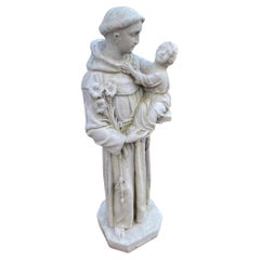 Belle sculpture figurative en ciment de Saint Antoine de Padua