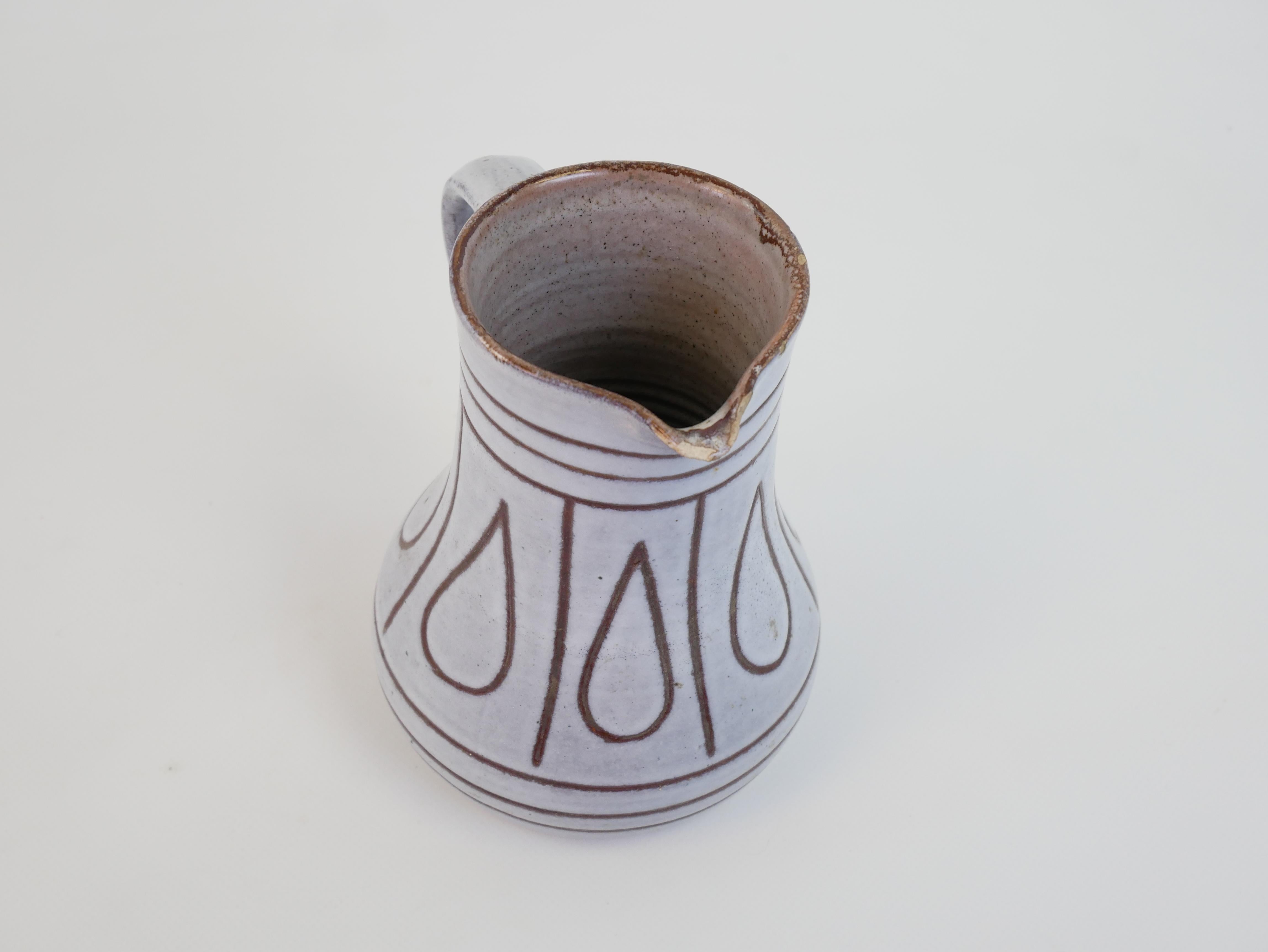 Lovely ceramic pitcher in the style of Jacques Innocenti For Sale 5