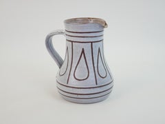 Lovely ceramic pitcher in the style of Jacques Innocenti