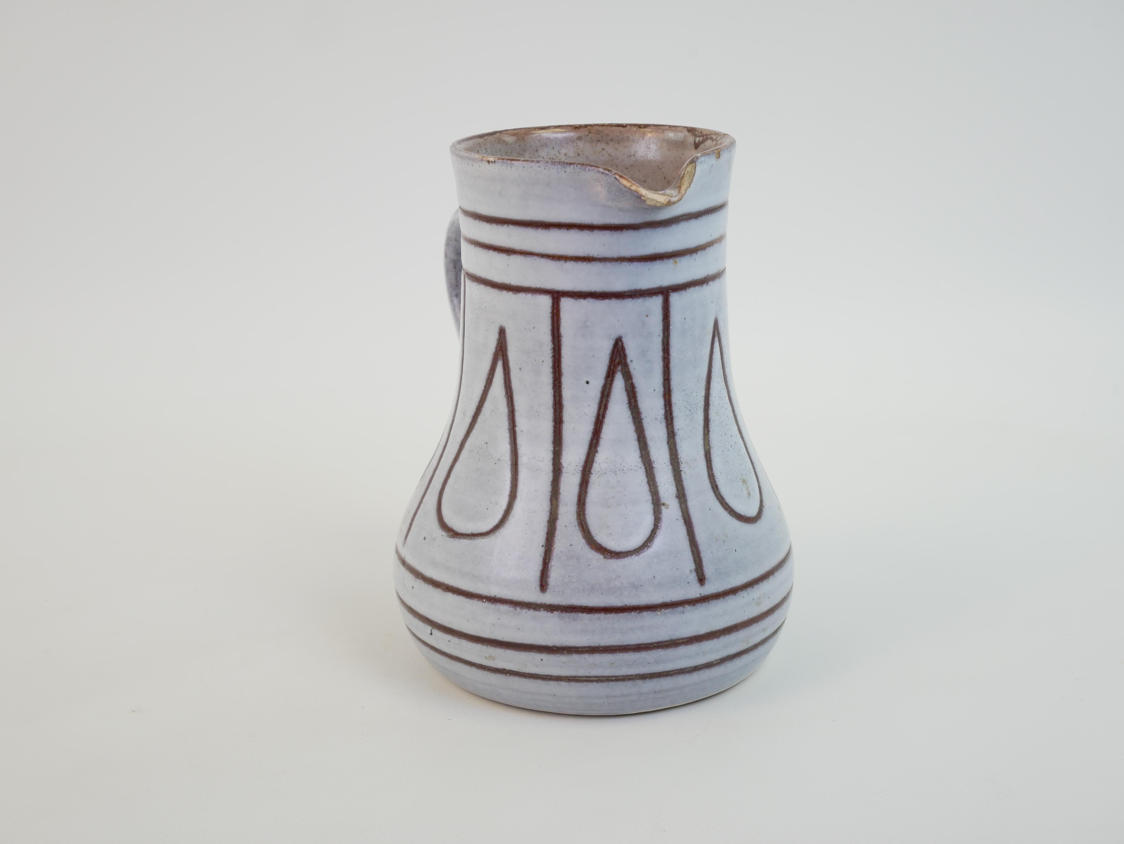 Mid-Century Modern Lovely ceramic pitcher in the style of Jacques Innocenti For Sale