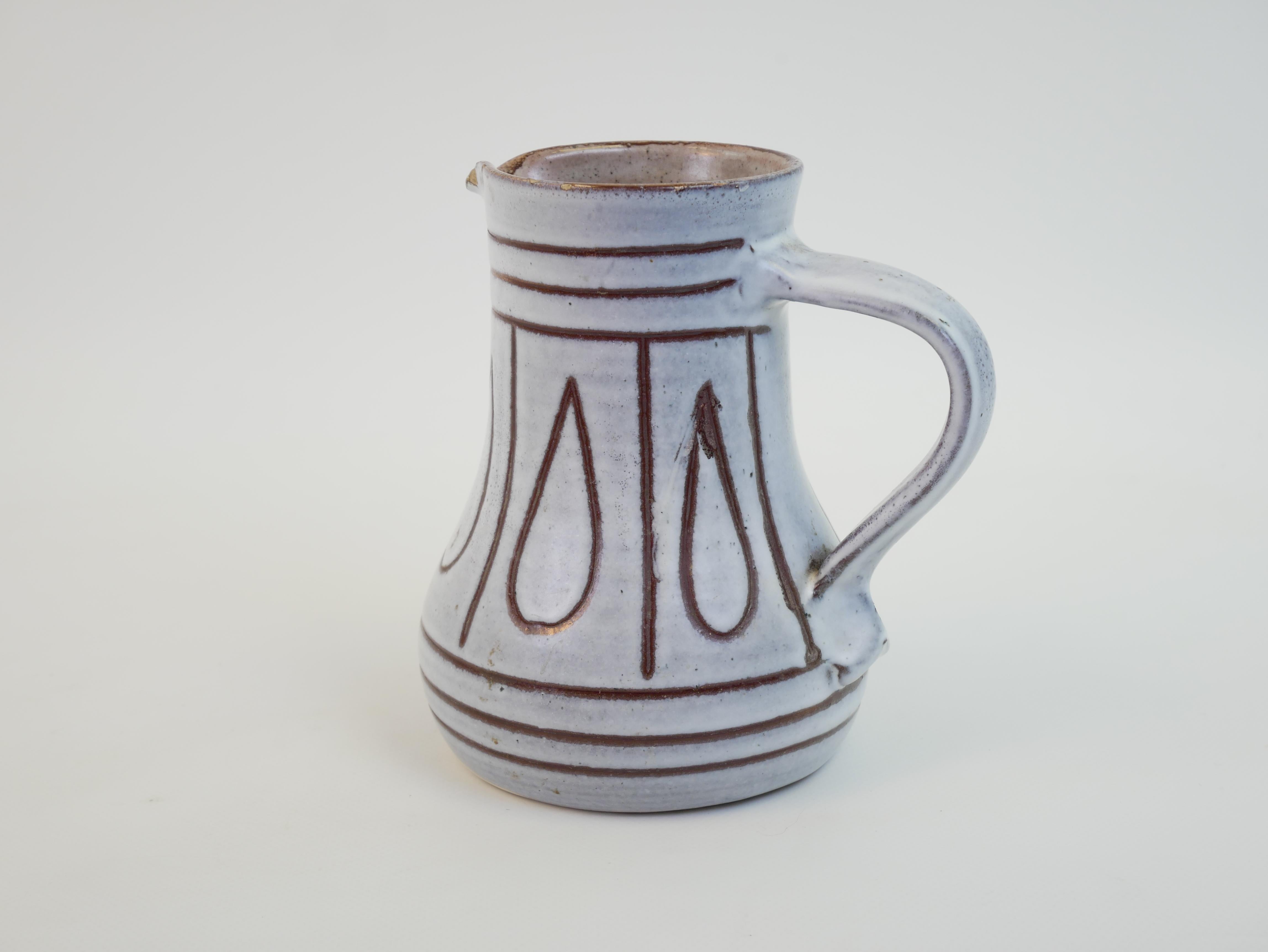 Mid-20th Century Lovely ceramic pitcher in the style of Jacques Innocenti For Sale