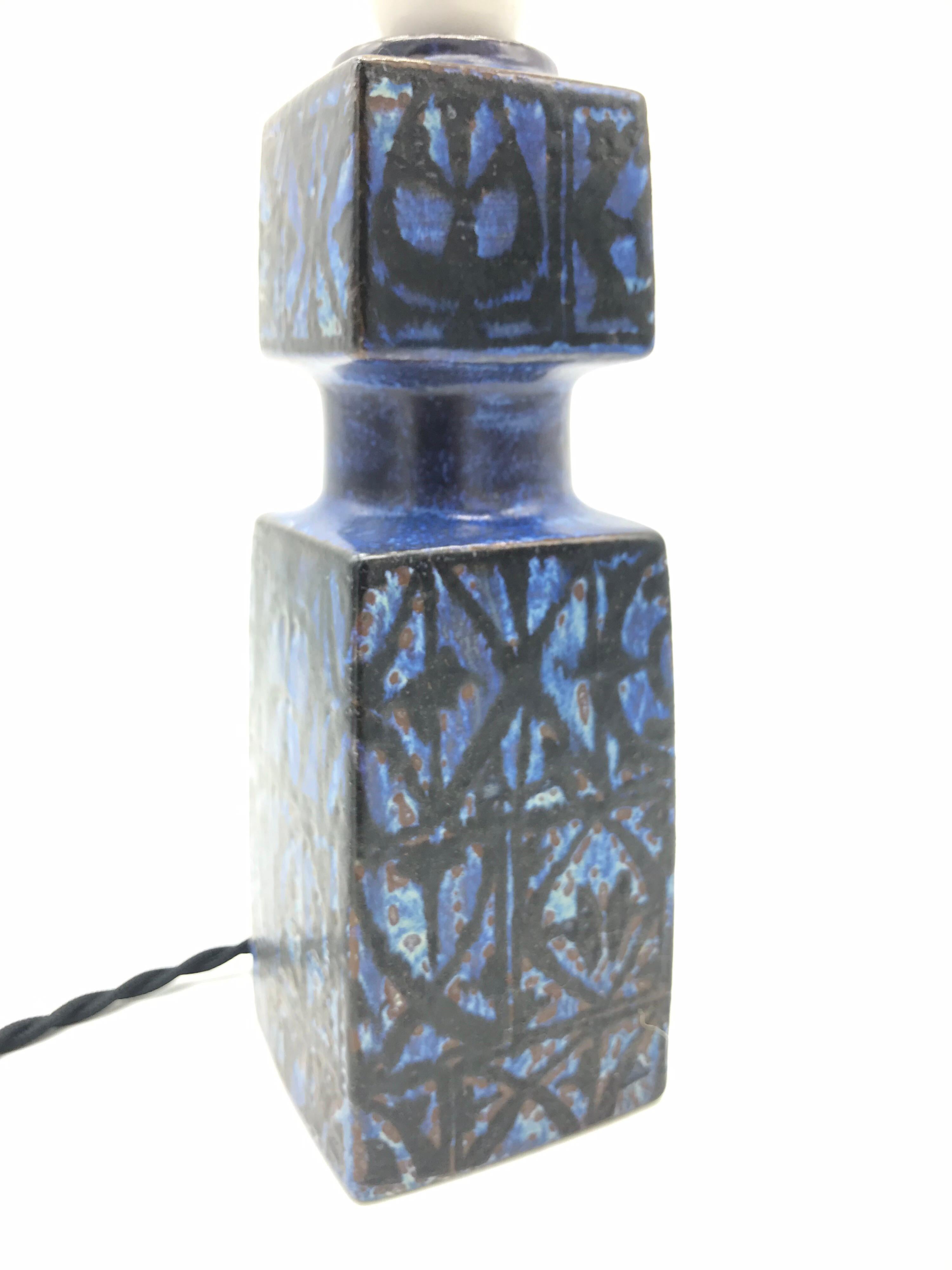 Lovely ceramic table lamp by Fog & Mørup of Copenhagen.
Geometric designs in blue and black.
Rewired and ready to use.