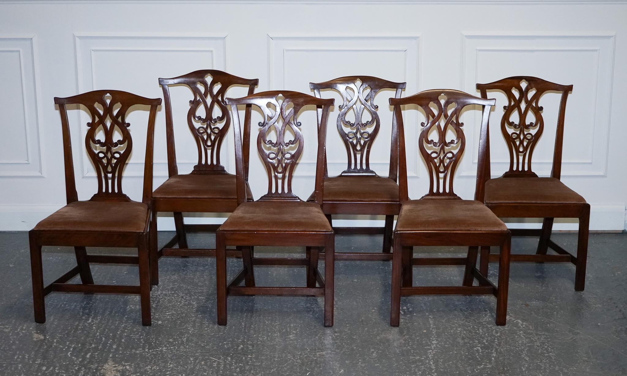 
We are delighted to offer for sale this Stunning Chippendale Style Set of 6 Dining Chairs.

A Chippendale style set of six dining chairs with H frames would typically feature Classic Chippendale design elements, such as graceful curves, straight