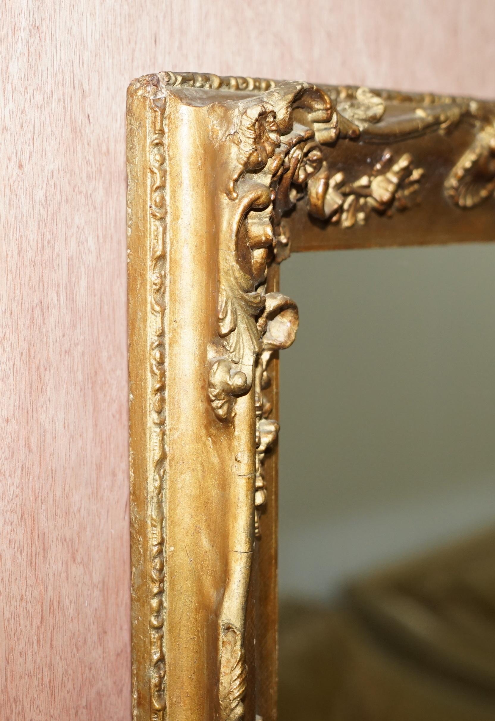 Lovely circa 1880-1900 French Giltwood Wall Mirror with Ornately Carved Frame For Sale 4