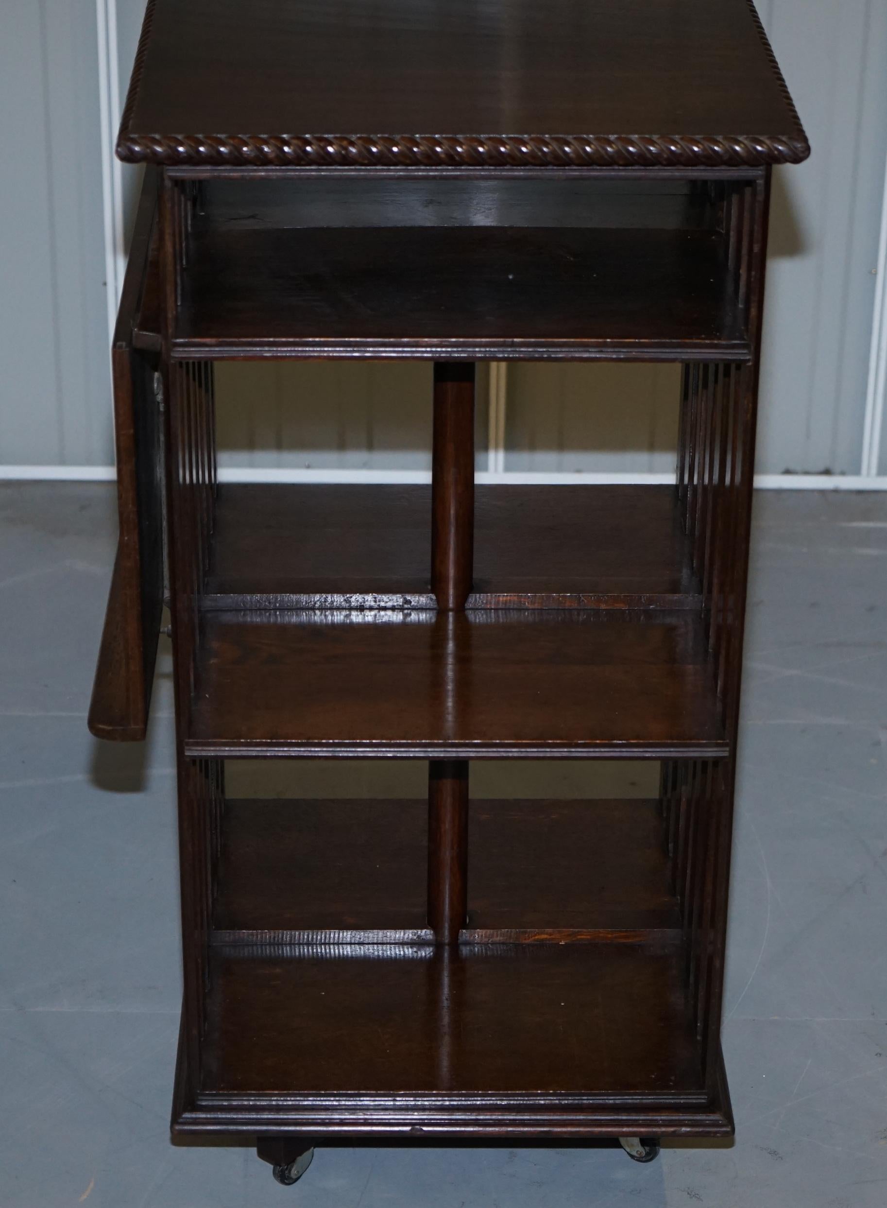 Early 20th Century Lovely circa 1900 Edwardian Solid Oak Revolving Bookcase with Lift Up Desk Piece
