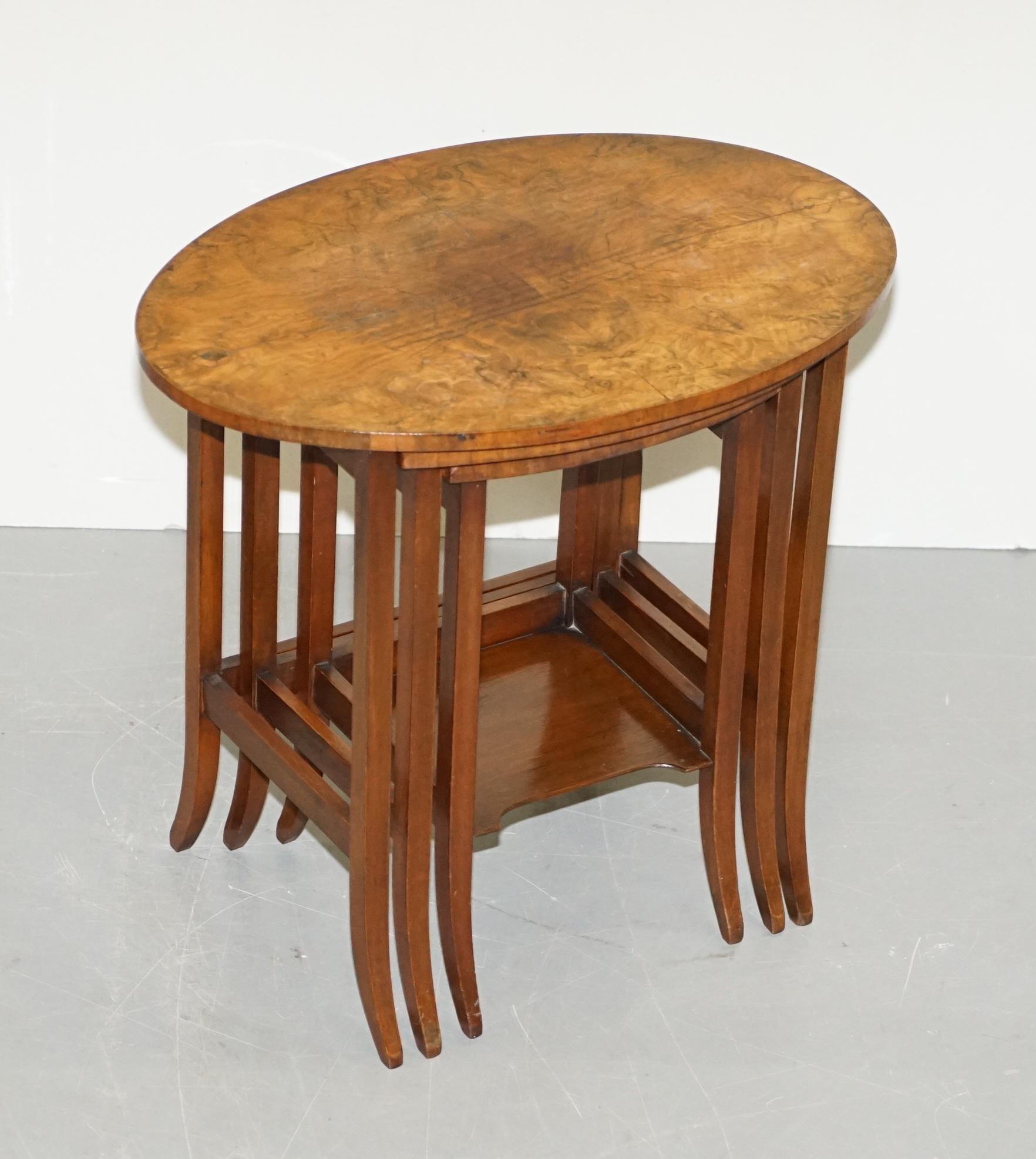 We are delighted to offer for sale this stunning Burr and quarter cut walnut nest of tables circa 1900

A very good looking well made and decorative suite, the main table is oval with the two nested tables being rectangle, the timber patina and