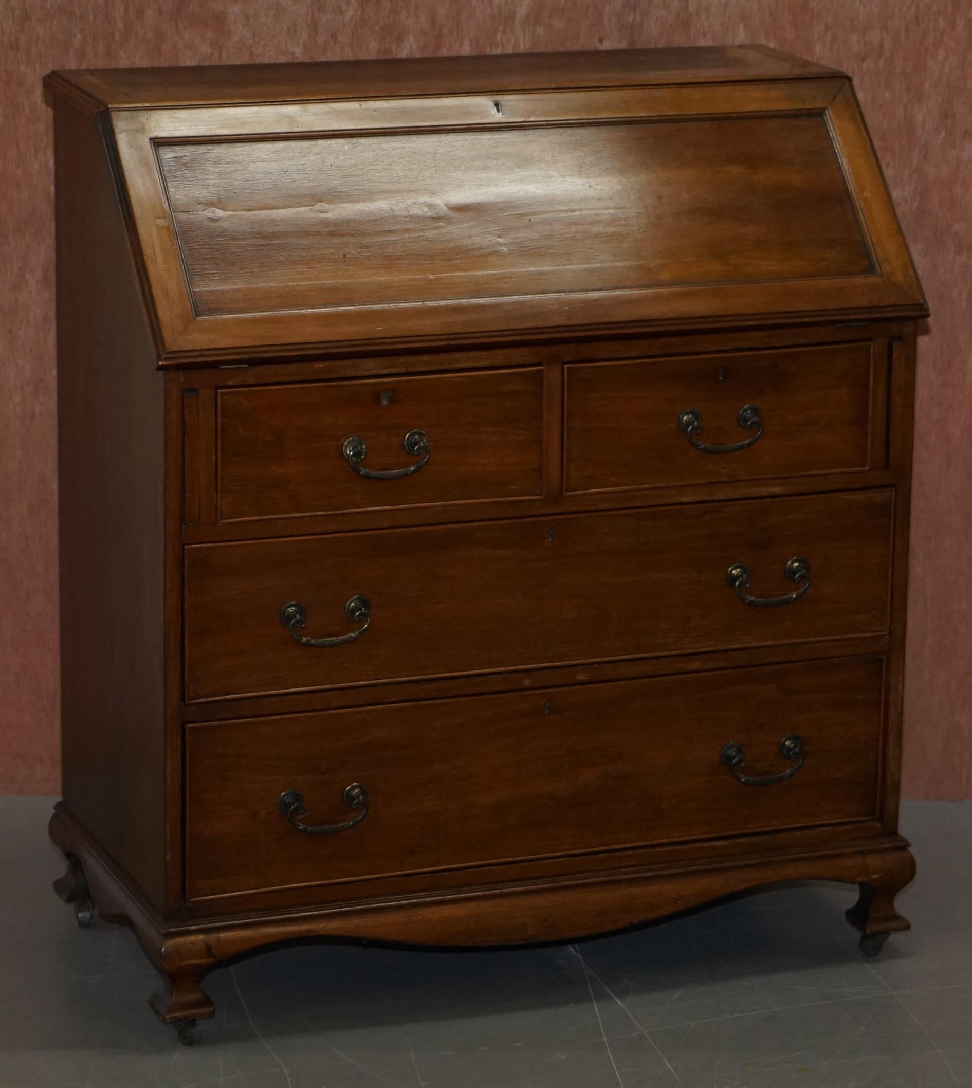 We are delighted to offer for sale this lovely late Victorian Walnut writing bureau with chest of drawers base

A good looking and versatile piece that sits on the original Victorian porcelain castors. This would have originally had a top that has