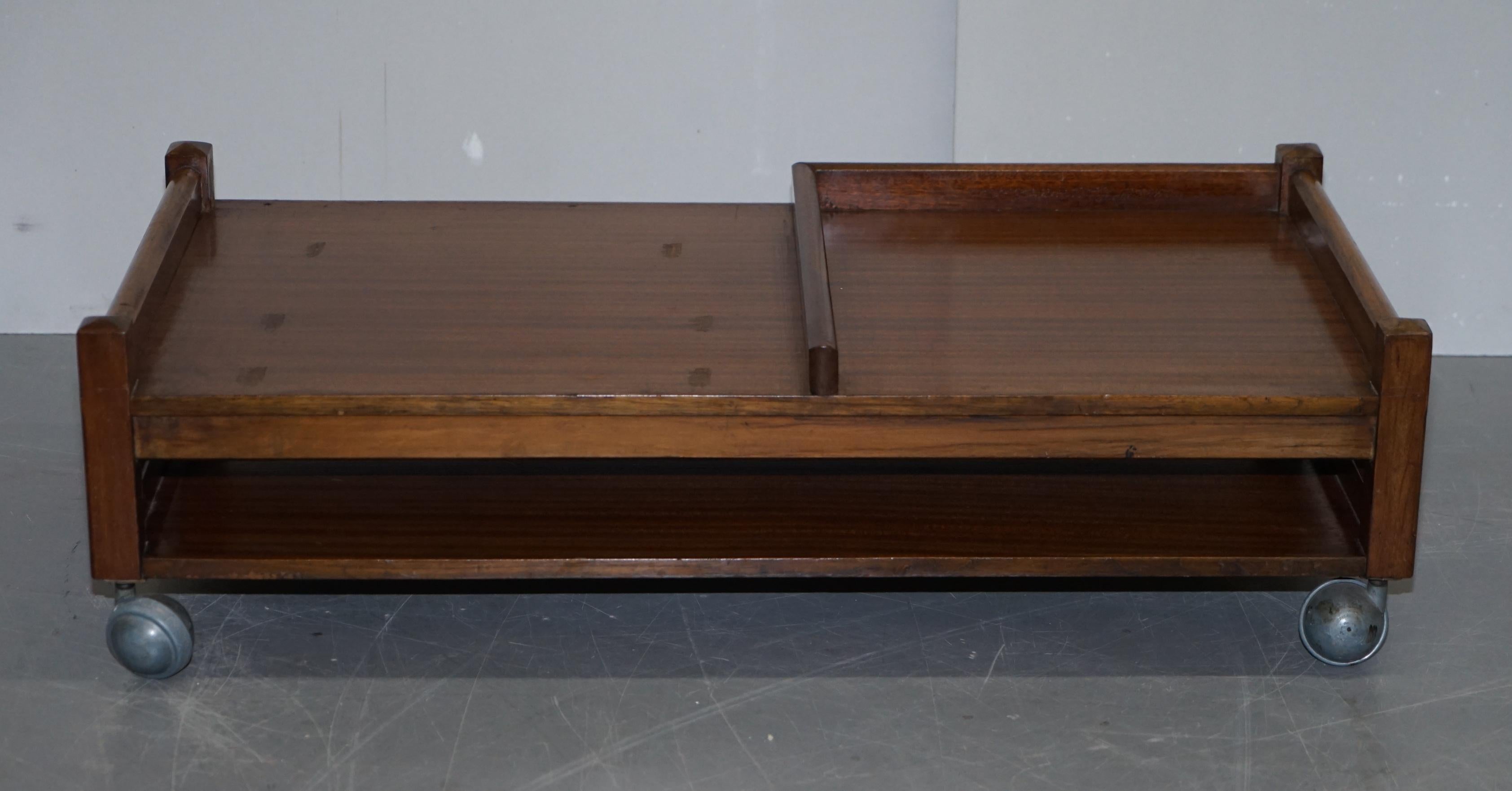 We are delighted to offer for sale this lovely very low Mid-Century Modern teak coffee table on Kendrick castors

A very good looking, well made and decorative coffee table

We have cleaned waxed and polished it from top to bottom, there will be