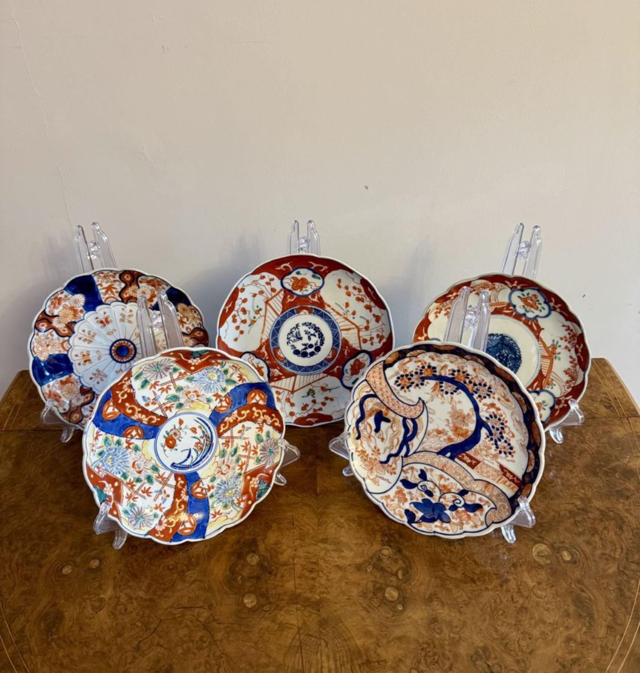Lovely collection of five antique Japanese imari plates having five quality antique Japanese imari plates decorated with flowers, trees and scrolls hand painted in stunning red, white, blue and green colours. 

D. 1900