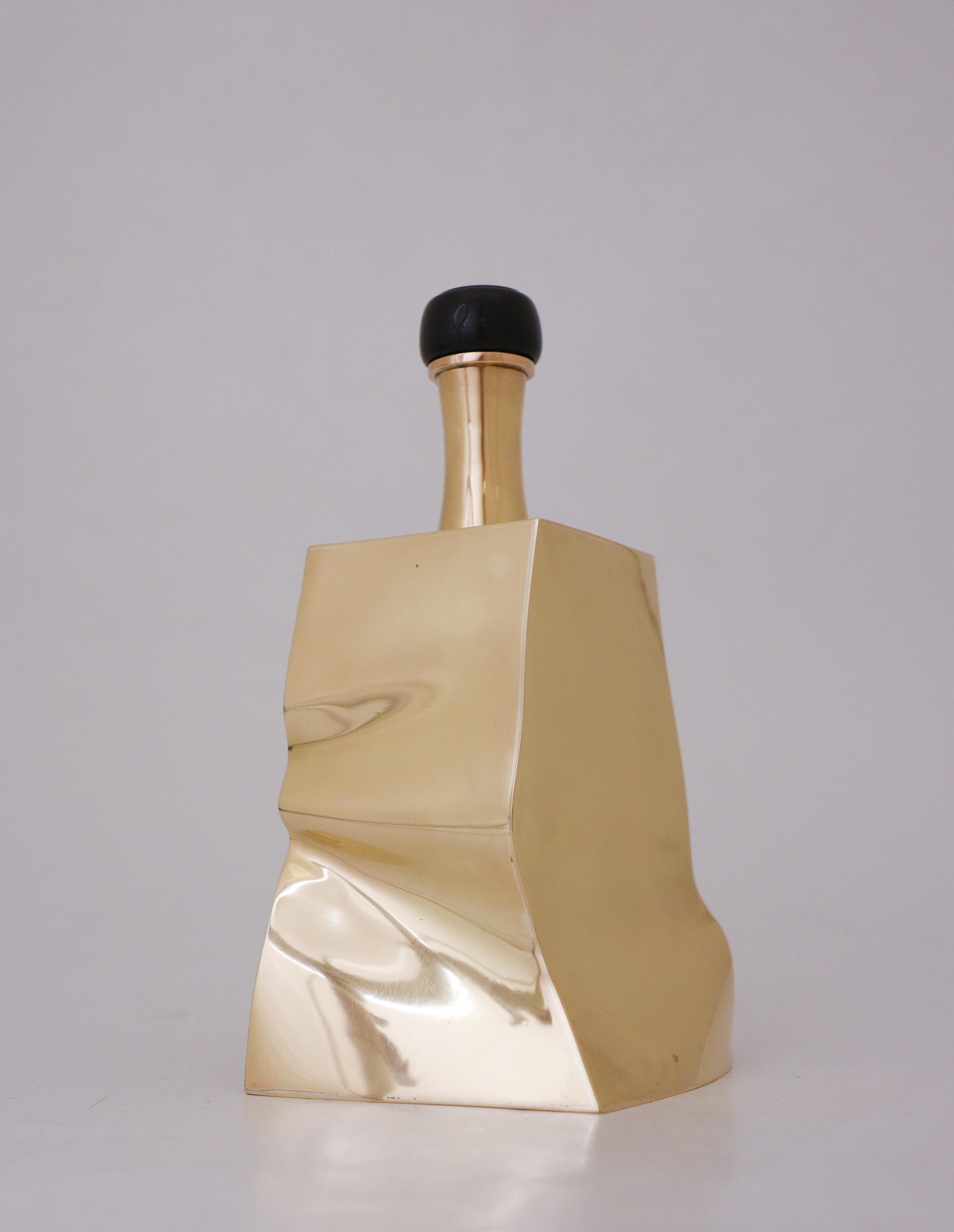 A lovely decanter designed by Per Myrström, Sweden in the 1974. It is 20 cm high and in very good condition except from some minor marks and scratches. It has a stunning shape and is made of brass with a plastic stopper.