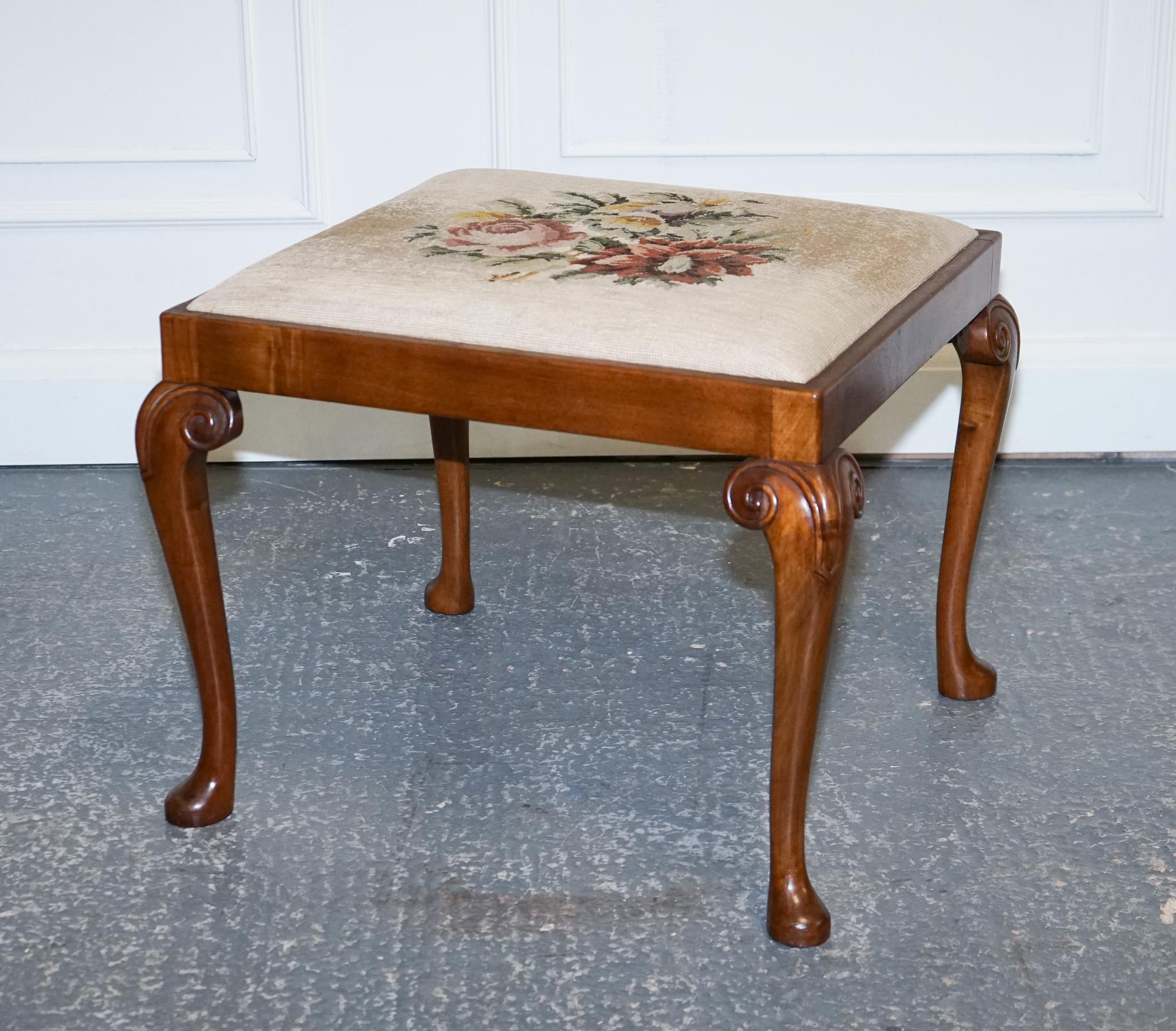 We are delighted to offer for sale this Antique Victorian Flower Embroidery Piano Stool With Carved Queen Anne legs

This Antique Victorian Flower Embroidery seat Piano Stool with Queen Anne legs is a stunning piece of furniture that exudes