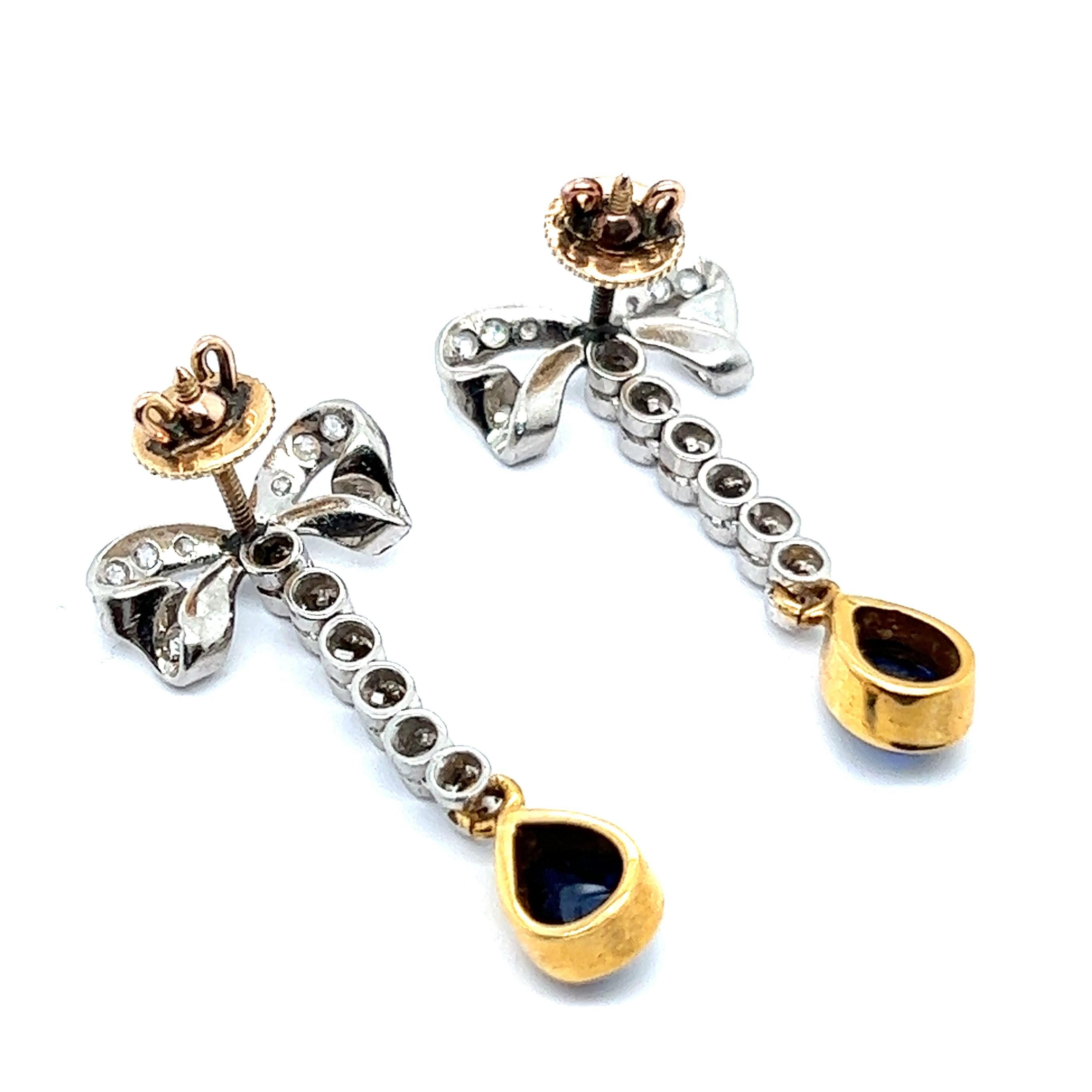 Georgien Ravissantes boucles d'oreilles à nœud en or jaune et platine avec diamants et saphirs en vente