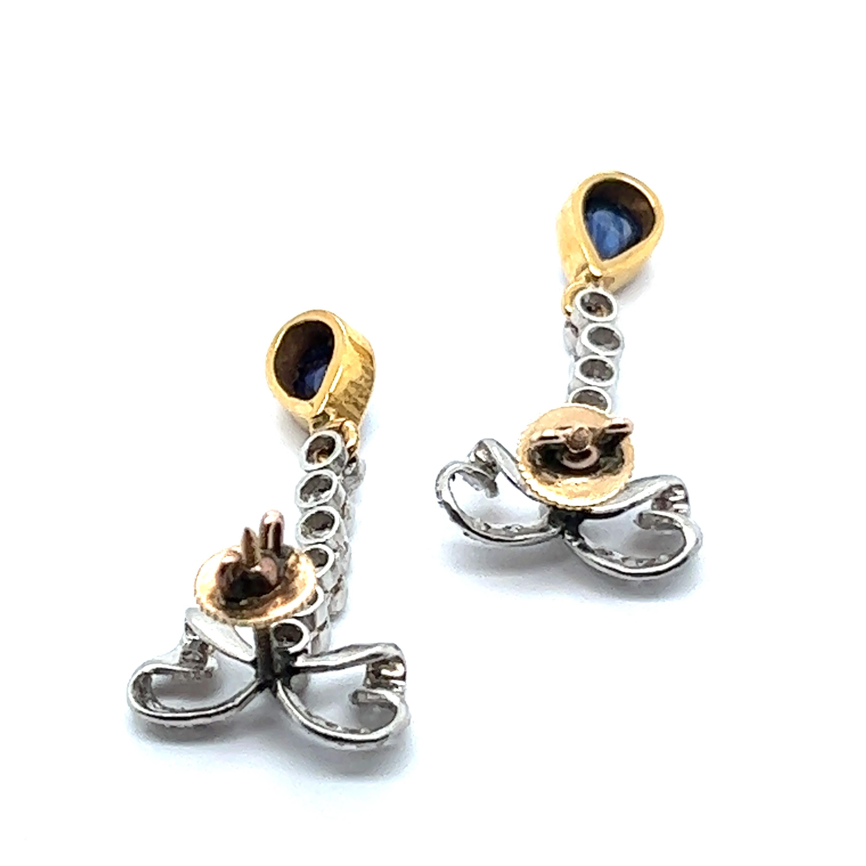 Ravissantes boucles d'oreilles à nœud en or jaune et platine avec diamants et saphirs Bon état - En vente à Lucerne, CH