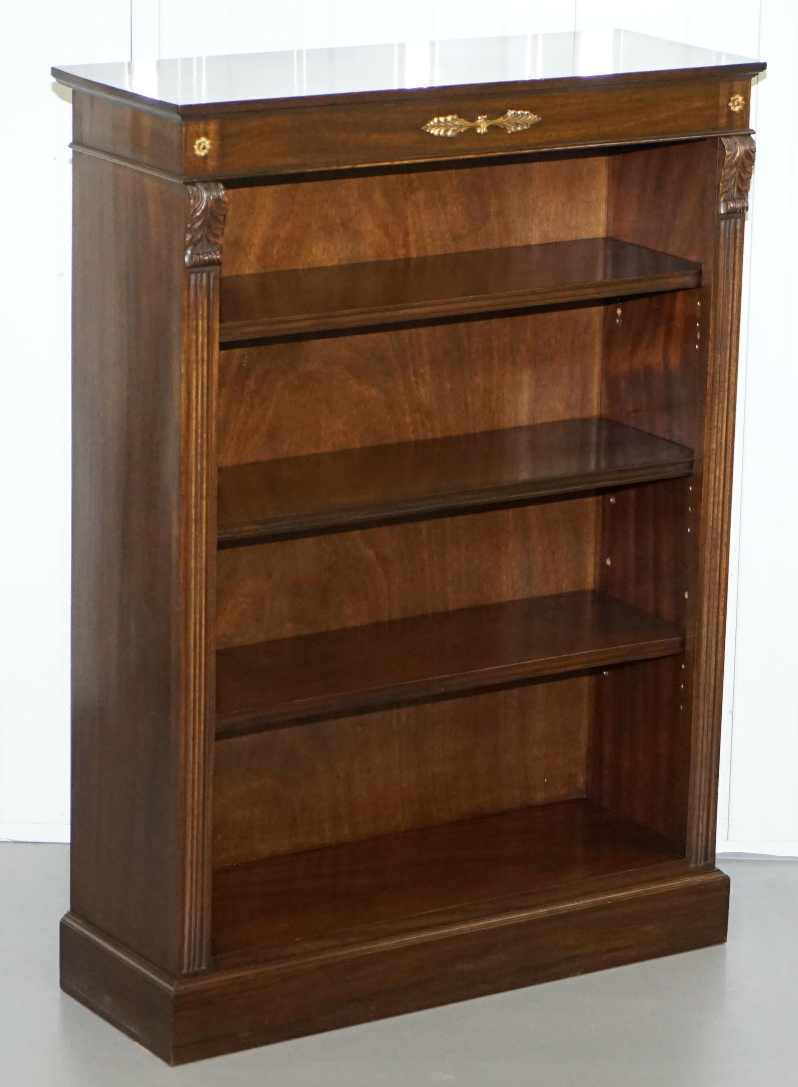 We are delighted to offer for sale this lovely mahogany with gilt bronzed metal fittings dwarf open bookcase

A good looking and functional piece of furniture. The shelves are all height adjustable and removable, someone has added some extra holes