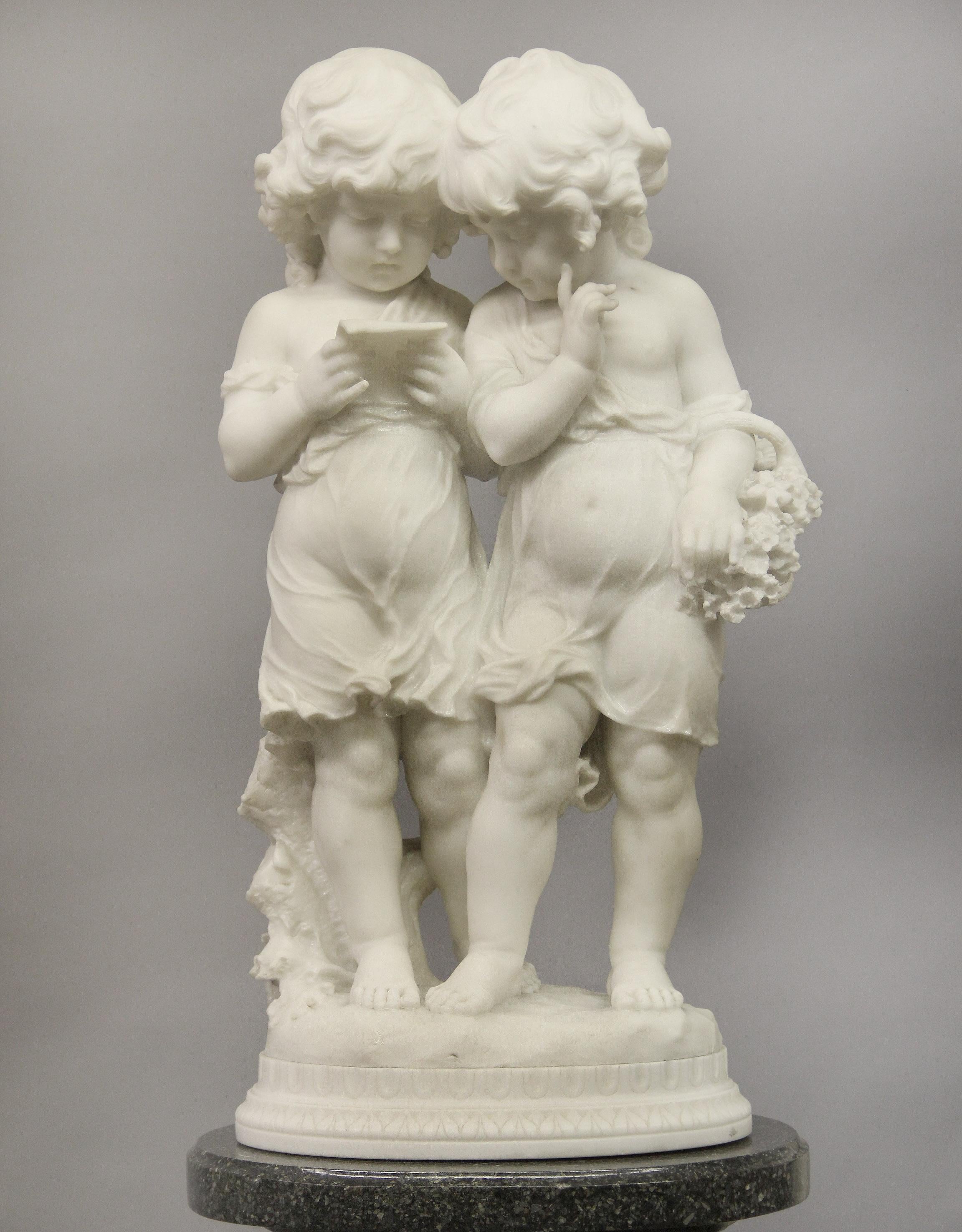 A lovely early 20th century Italian Carrara marble sculpture of two sisters by Affortunato Gory

Depicting two little girls reading, one with a basket of flowers, standing on a oval carved base

Inscribed A. Gory

Affortunato Gory 1895-1925