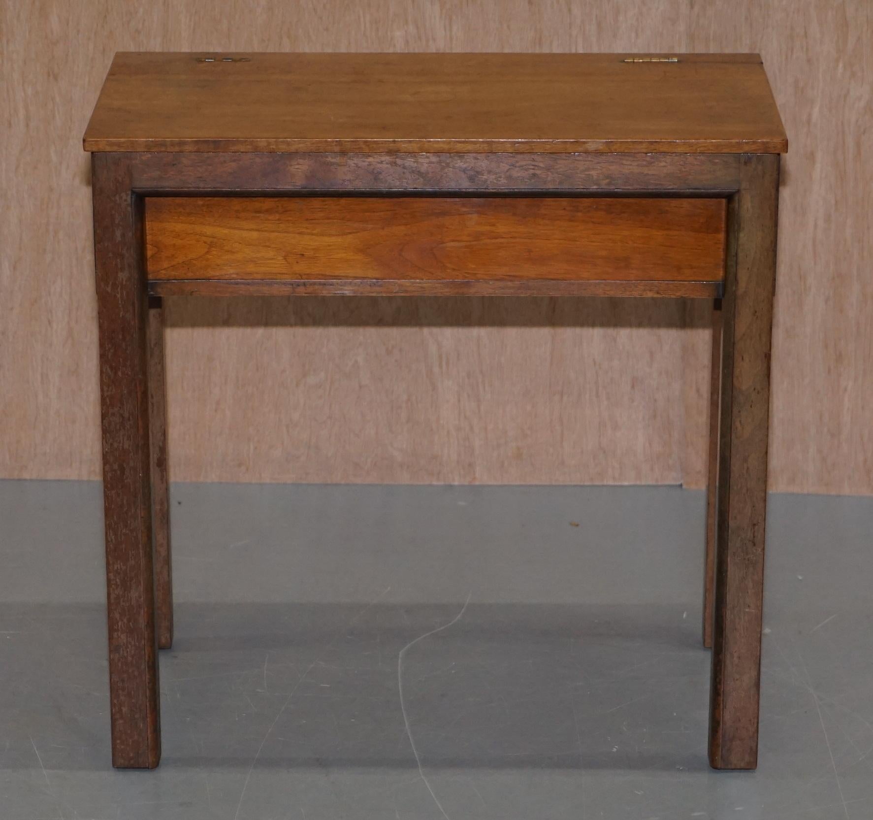 We are delighted to offer for sale this lovely original Edwardian solid English oak children’s school writing desk 

A well made decorative piece, its very utilitarian and works as well today as it did when new. The internal storage has dividers