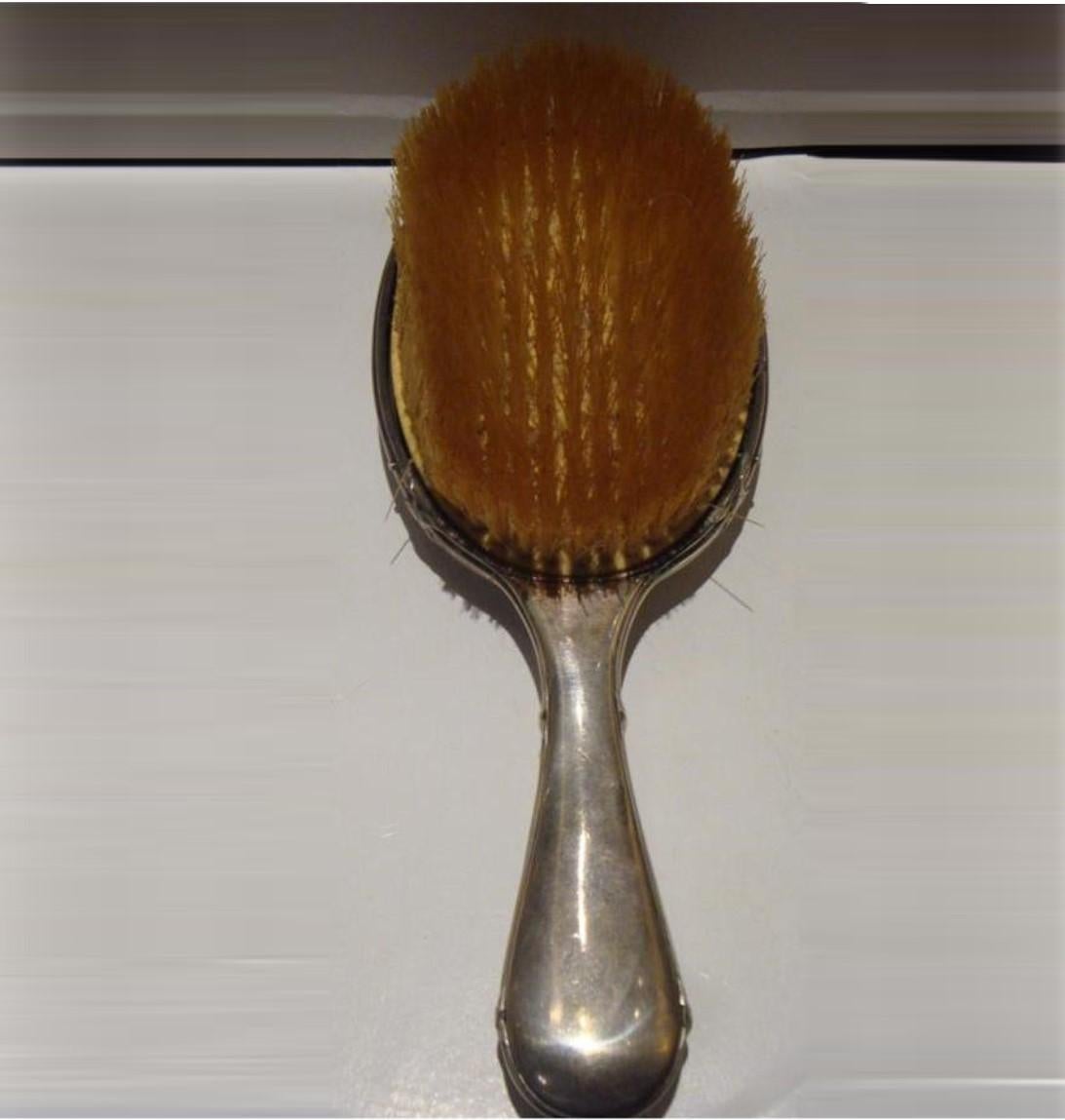 The Following Items we are Offering is An Outstanding Museum Quality French 19th Century Sterling Silver Hair Brush by Maison BOIN TABURET with Ivory Relief. TAKEN OUT OF AN IMPORTANT ESTATE. TRULY A RARE FIND!!!  

Measurements: 9 1/4