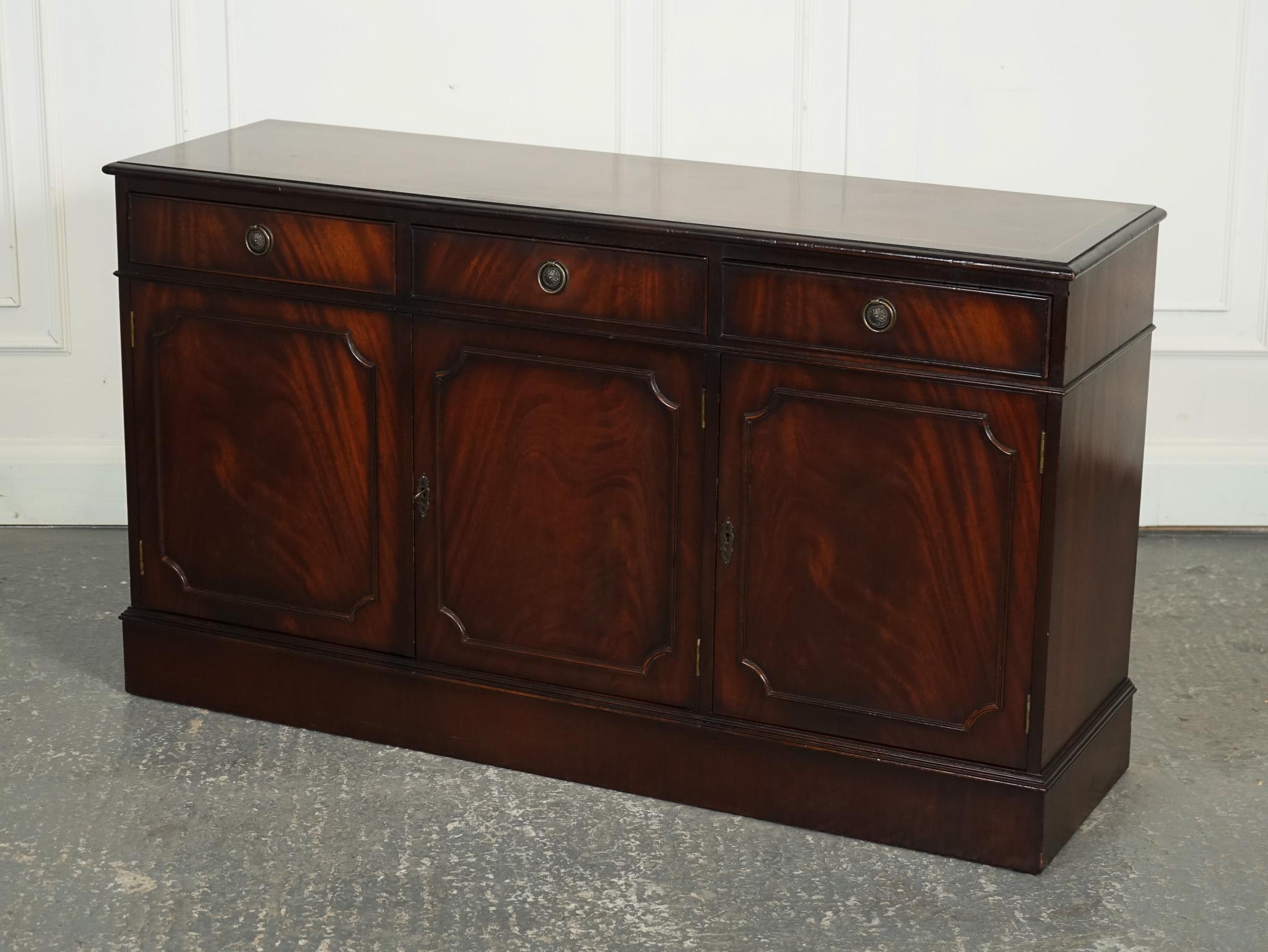 
We are delighted to offer for sale this Lovely Flamed Hardwood Sideboard.

A lovely flamed hardwood Georgian-style buffet sideboard is a magnificent and elegant furniture piece that exudes traditional charm and sophistication. The term 