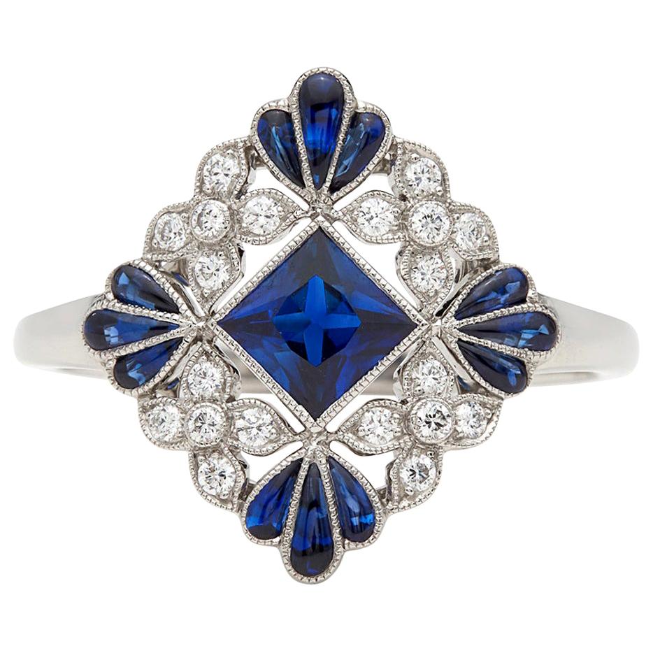 Lovely Floral Sapphire and Diamond Platinum Ring For Sale