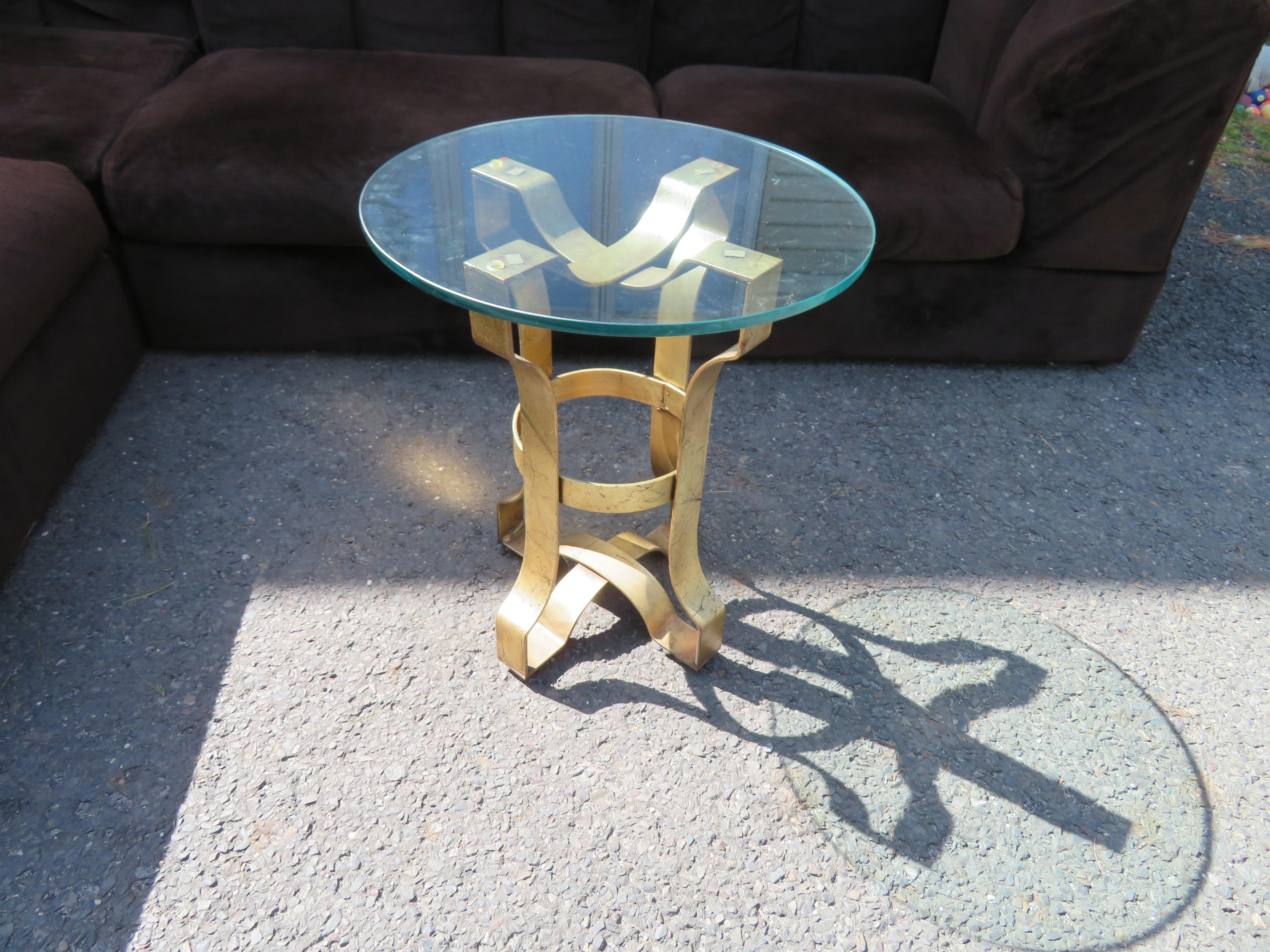 Stunning Hollywood Regency gilt gold iron scroll side table. This table measures 22.5
