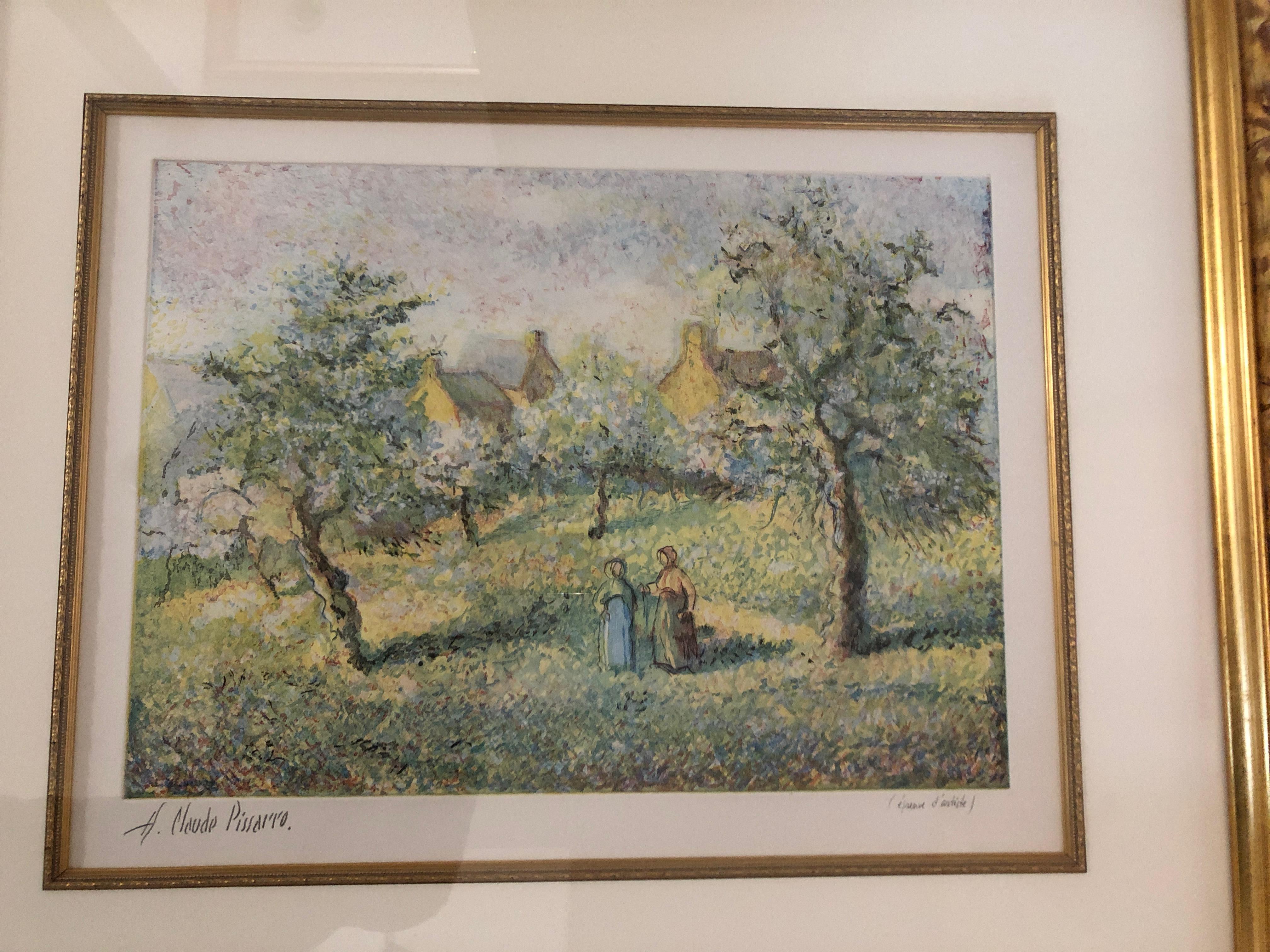 A beautiful pastel colored landscape of trees in bloom (Arbrers en fleurs) with two women walking down a country road. Aquatint by H Claude Pissarro, signed lower left. Gorgeous custom gilded frame, linen mat and interior gold filet. Art measures 19