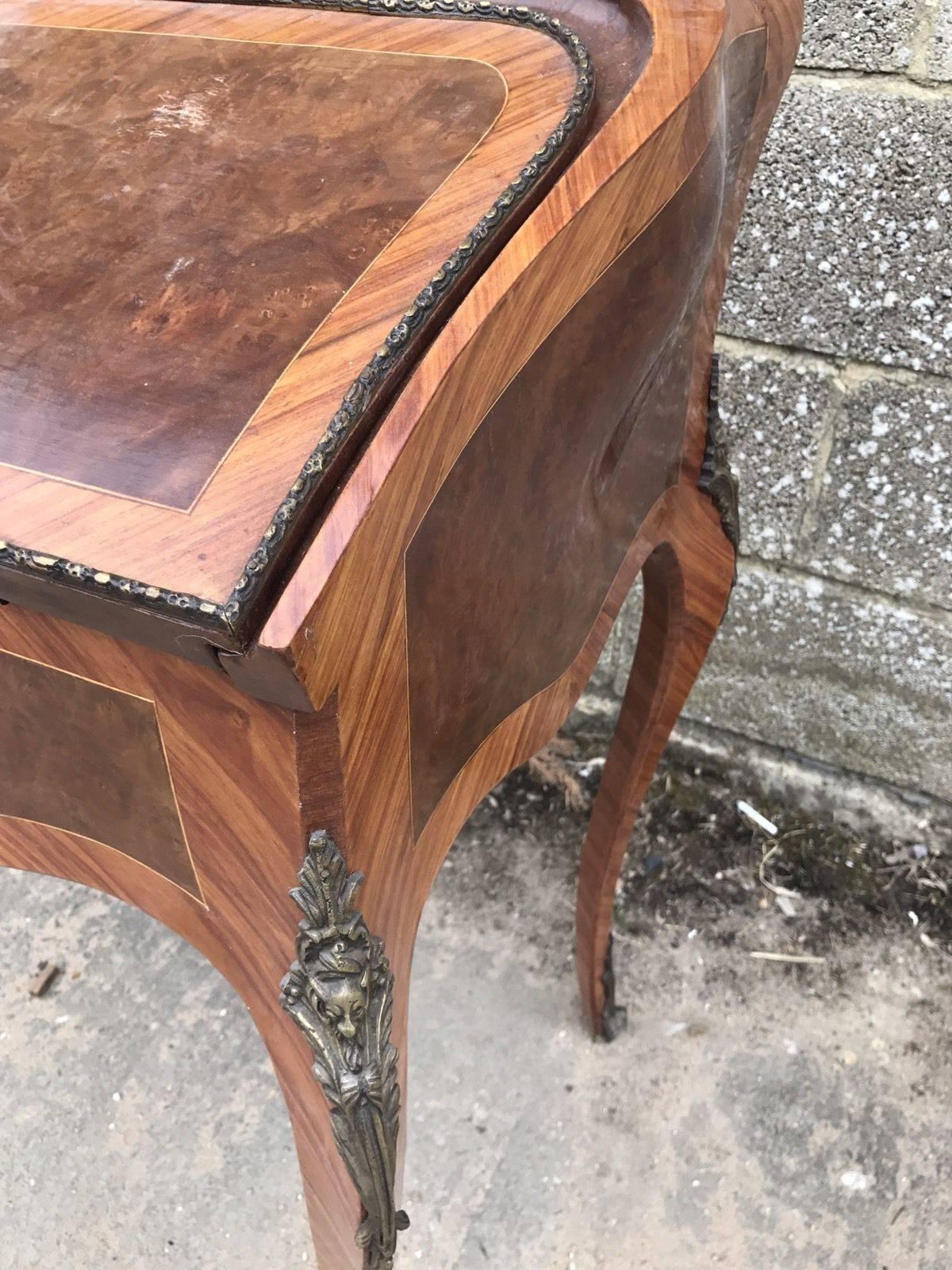 This is a beautiful french dressing Bureau/desk that has numerous drawers and flap down. As you can see, it has lovely inlaid decoration and is in great condition for its age.


Dimensions- 76cm wide, 93cm tall and 49cm deep (76cm with flap