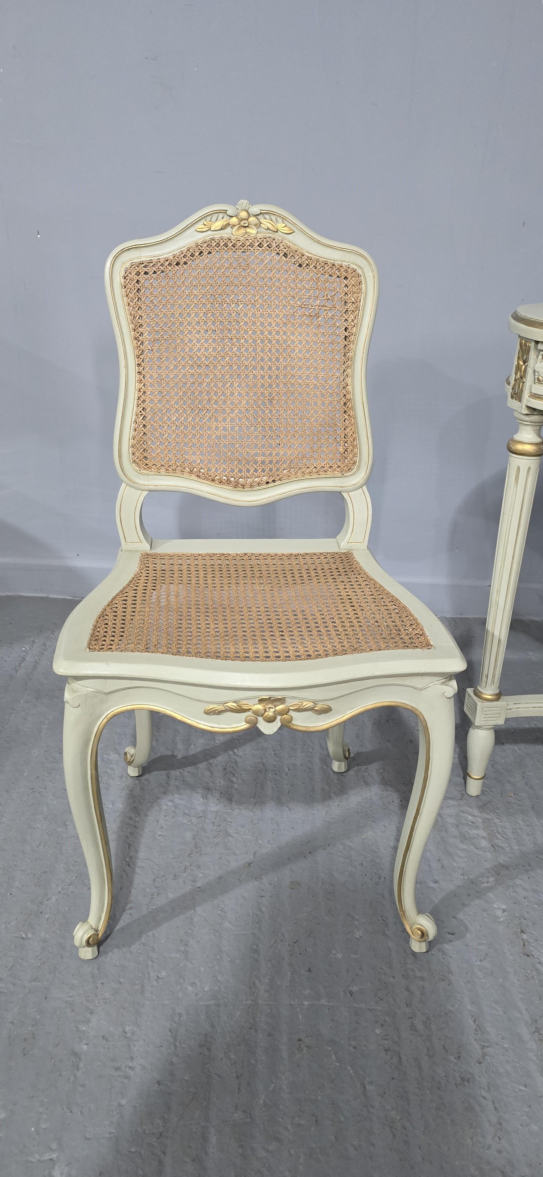 Very pretty French painted kidney shaped dressing table with bergere panels, three drawers and bevelled mirror, with matching bergere chhair, in very good overall condition.

59