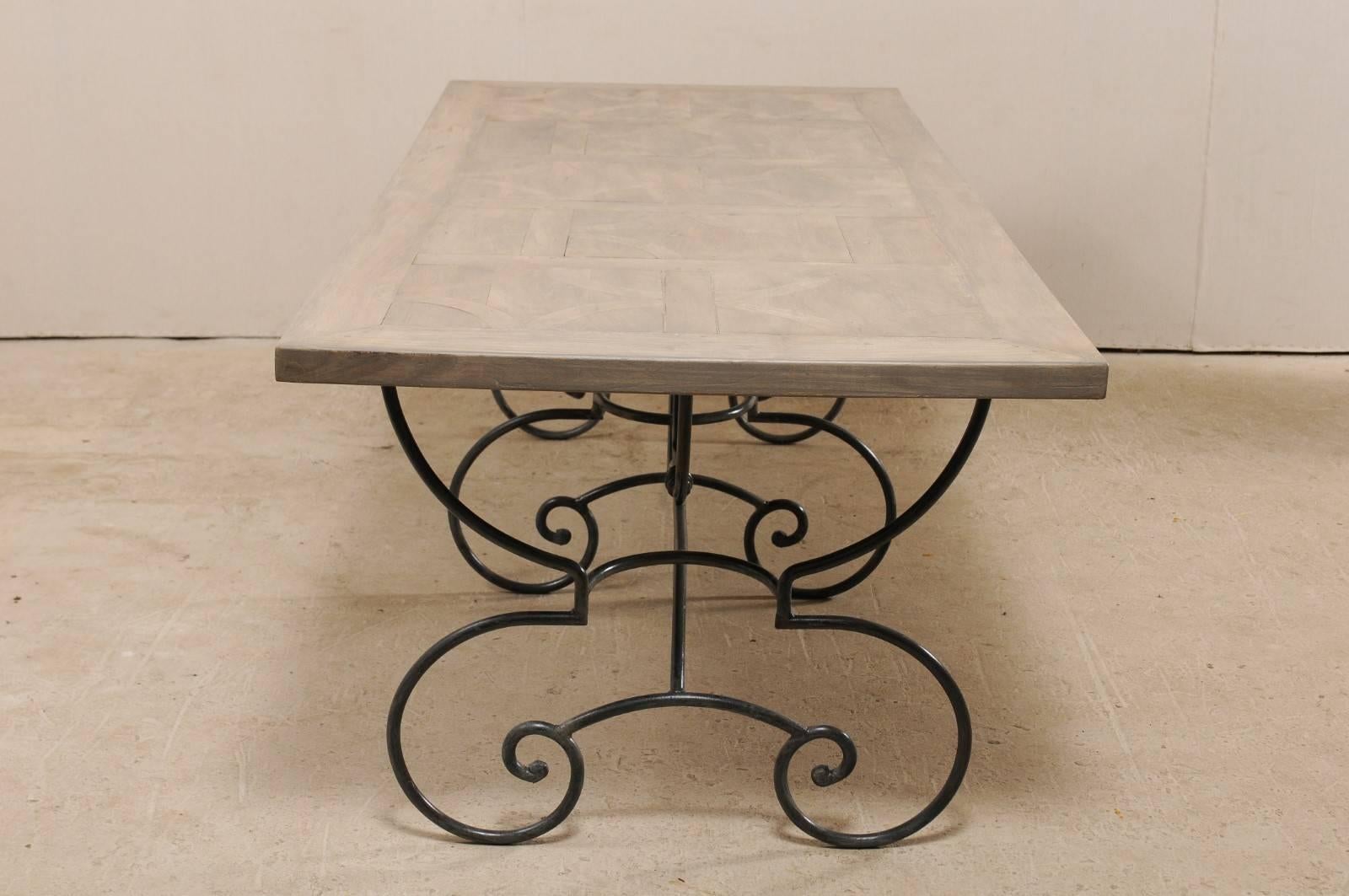 French Vintage Table with Inlay Wood Top on a Beautiful Scrolling Iron Base For Sale 1