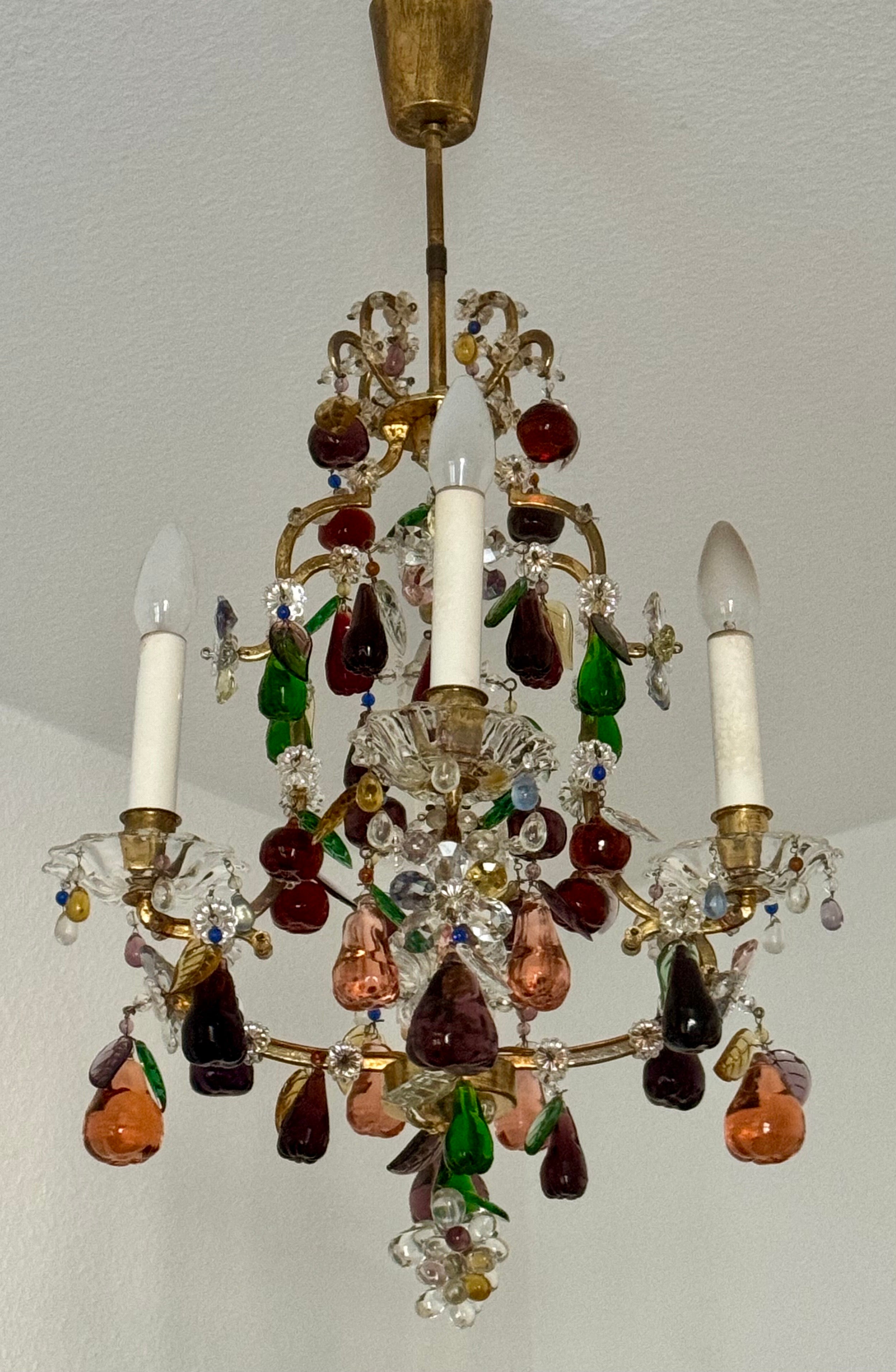 A beautiful and lovely hand-crafted gilt iron and colorful glass 