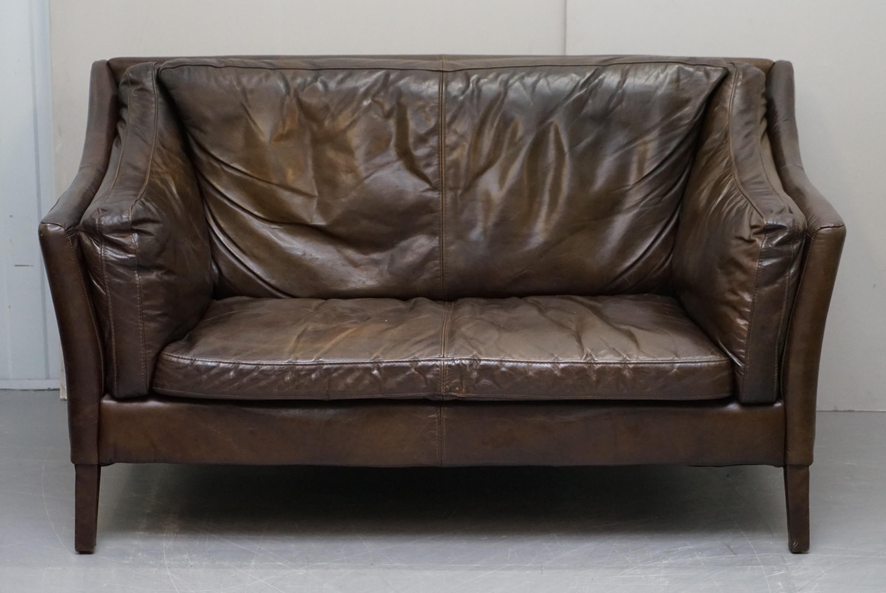 We are delighted to offer for sale this lovely exceptionally comfortable and very compact Halo Reggio brown leather sofa

I owned one of these sofas myself for years, they are exceptionally comfortable, there is just something about the form and