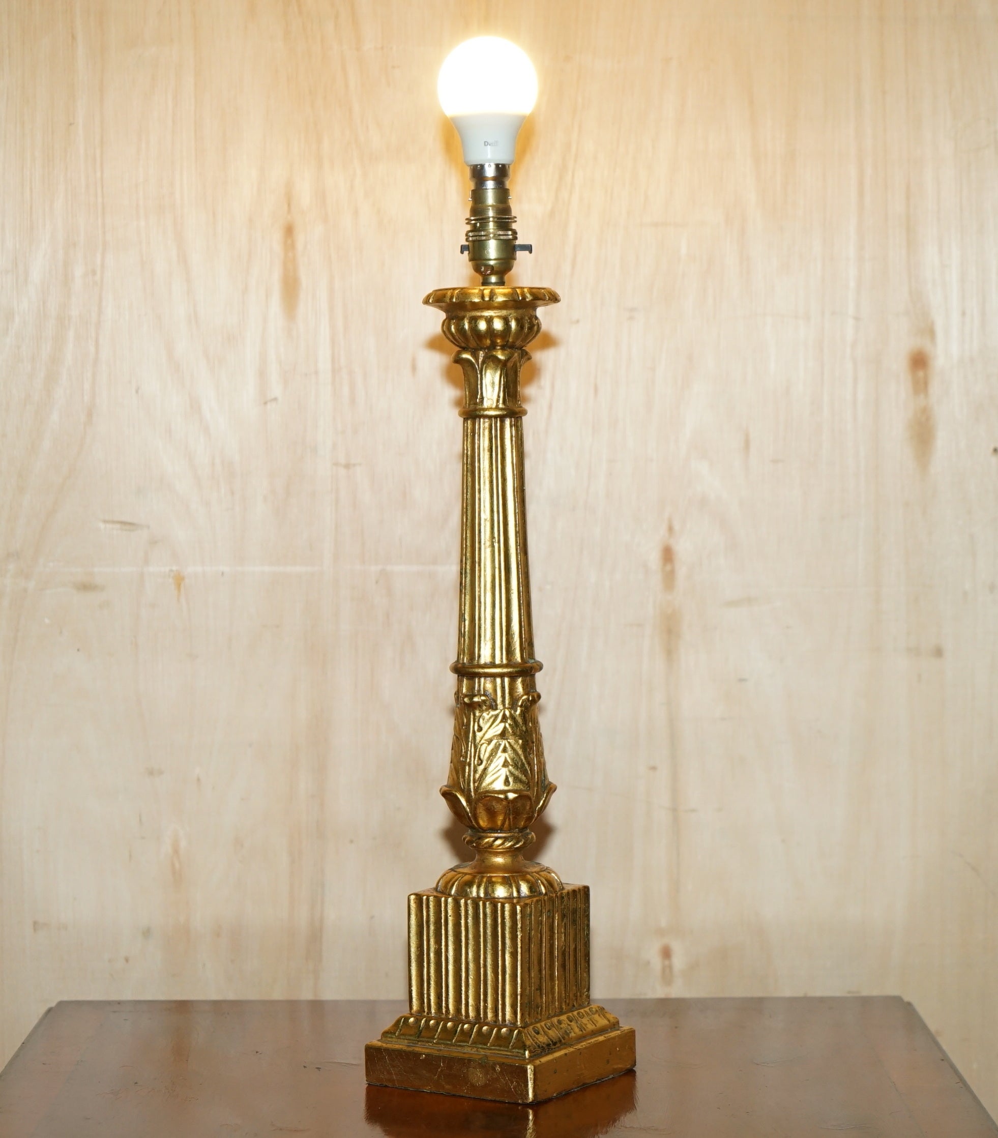 Royal House Antiques

Royal House Antiques is delighted to offer for sale this absolutely stunning circa 1960 hand carved and gilded table lamp in the form of a Corinthian pillar base 

Please note the delivery fee listed is just a guide, it covers