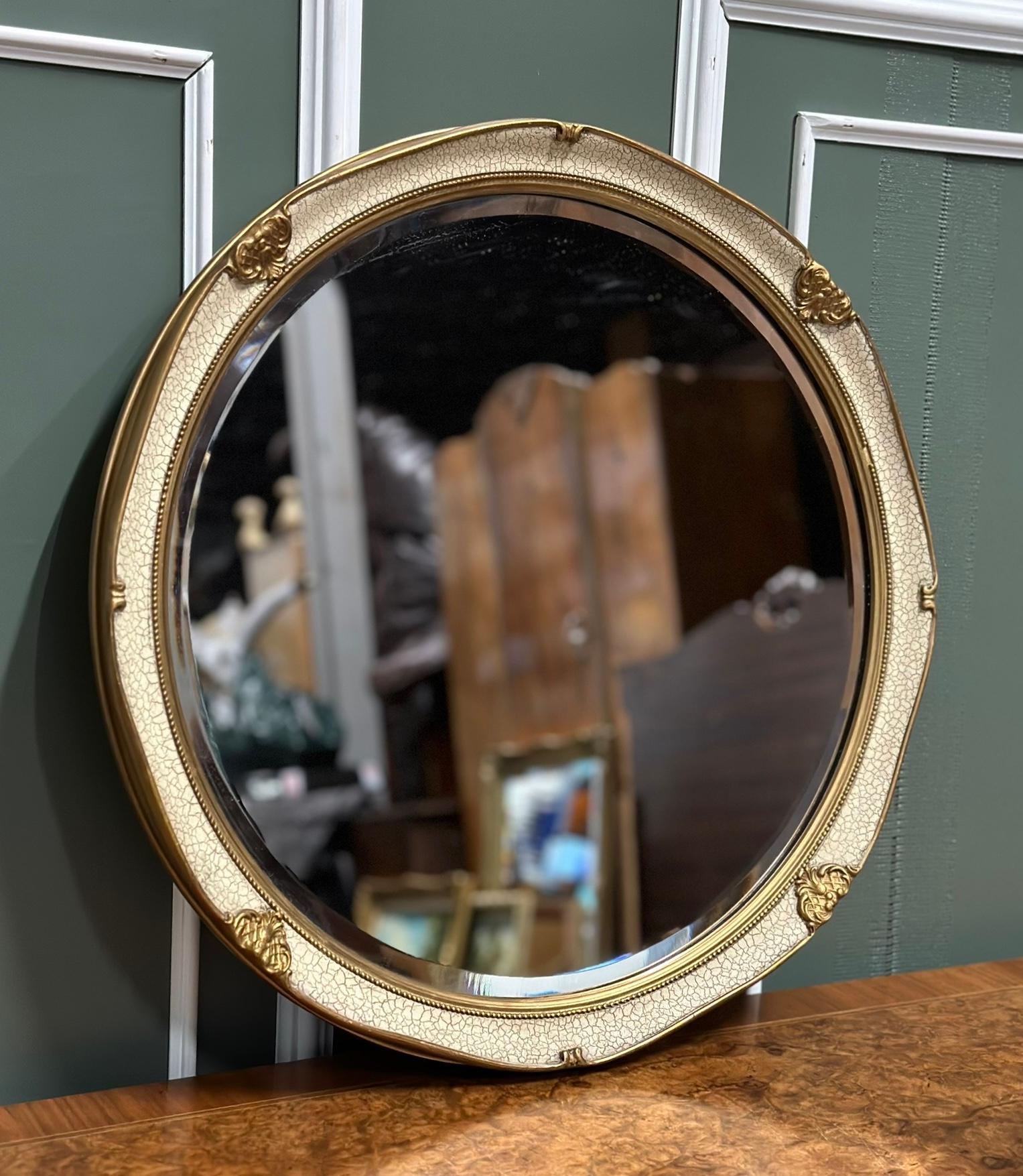 We are excited to present this lovely hand-painted white round wall mirror with gilt detail.

Very decorative piece with lovely gilt painted details.
It has an excellent metal chain on its back to make it easy to hang anywhere you'd like.

We