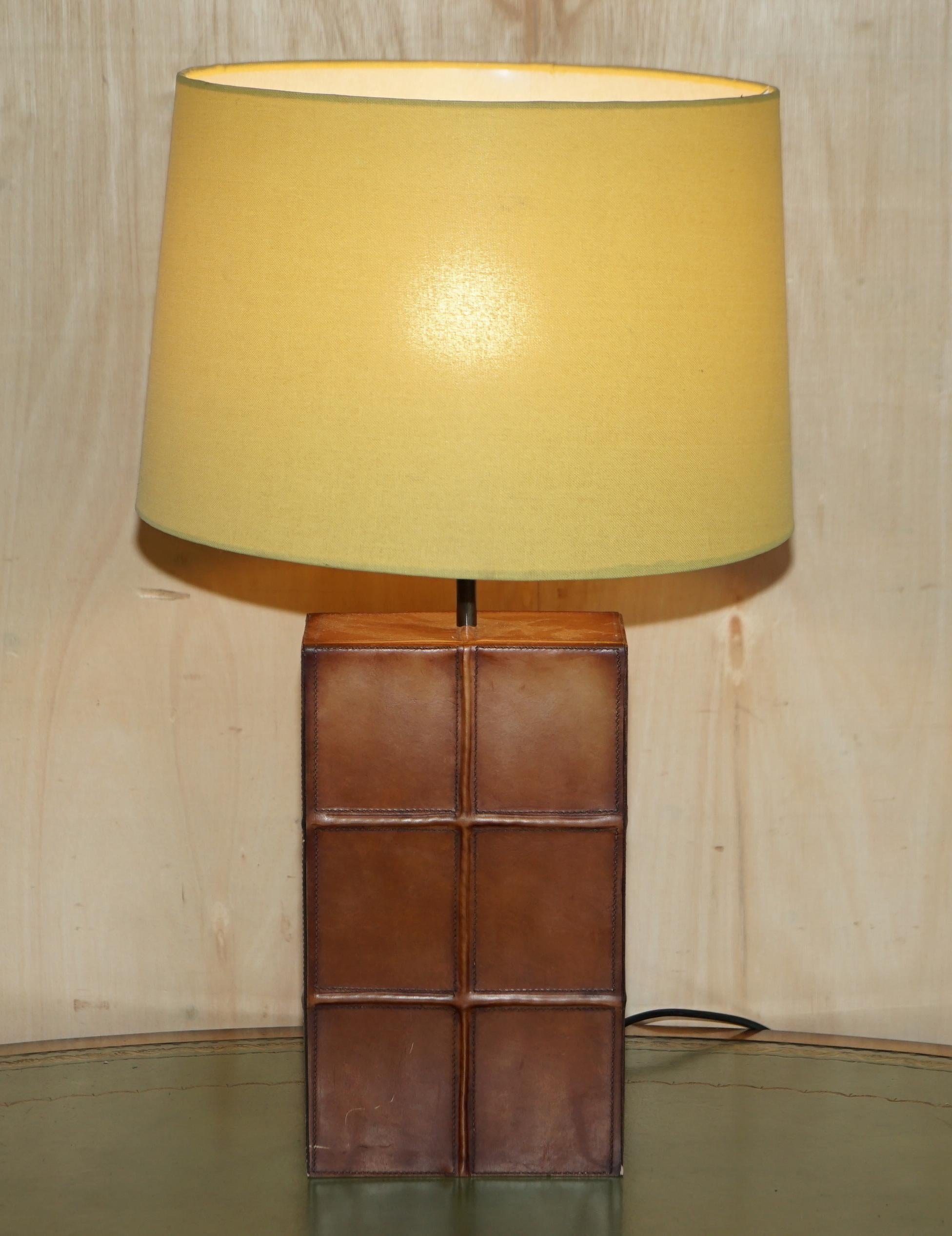 We are delighted to offer for sale this lovely hand stitched brown leather table lamp

I’m now listing around 20 lamps, please check out my other items for all shapes and sizes, they are all pictured with bulbs so you can see them working but the