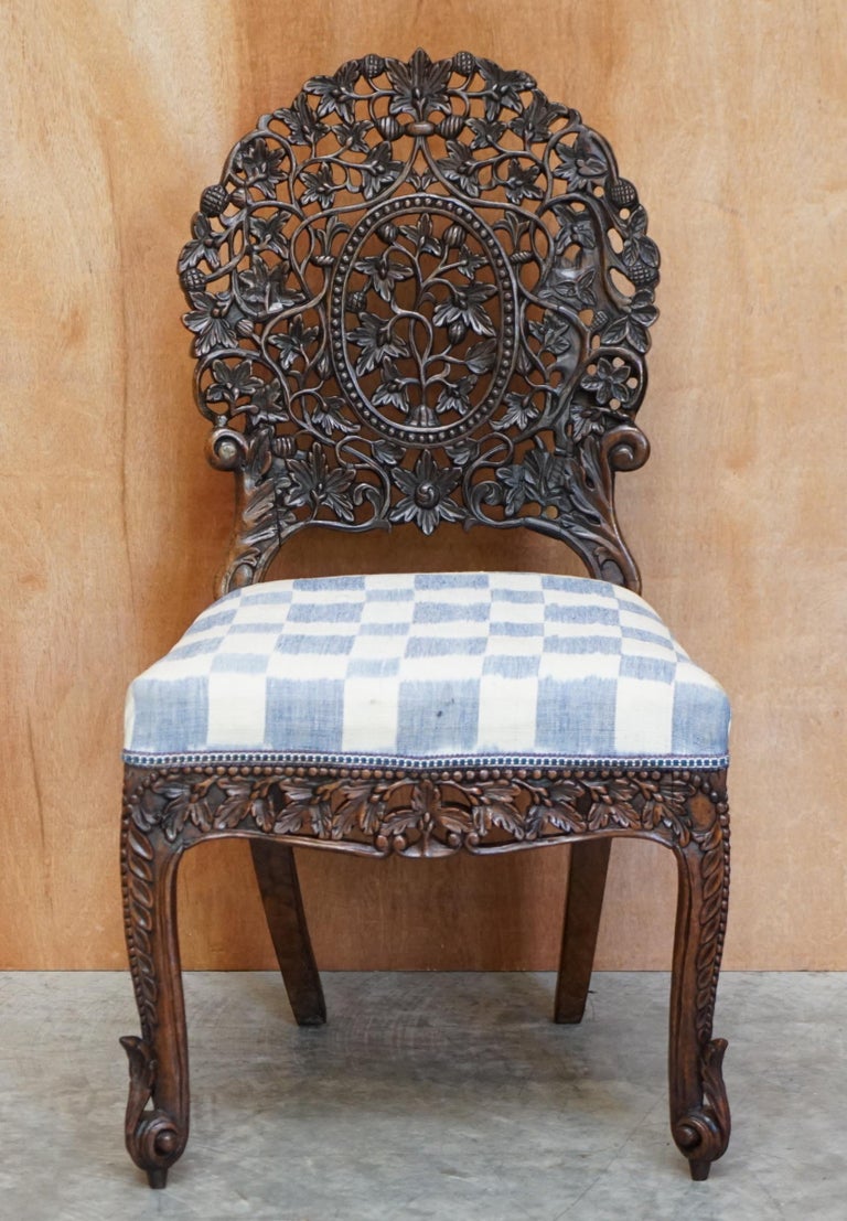 We are delighted to offer for sale this original solid hardwood Anglo-Indian Burmese hand carved chair

The condition is good, it has been restored to include having the frames checked, glued and clamped where required. It has some old repairs to