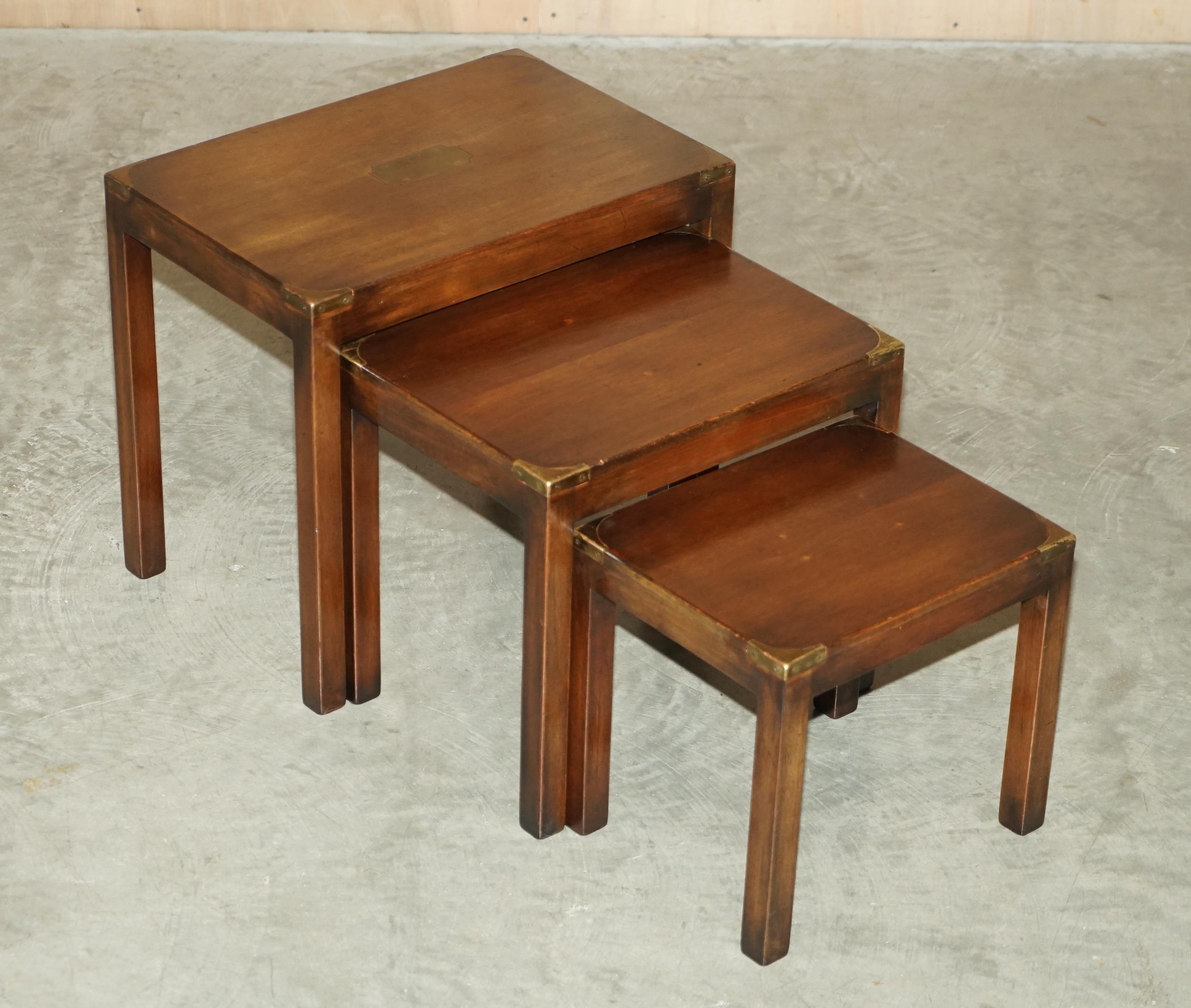 We are delighted to offer for sale this lovely Harrods Kennedy nest of three Military Campaign side tables

A nice decorative set, they are made in the military campaign style so brass fittings and in light mahogany.

The set has been cleaned
