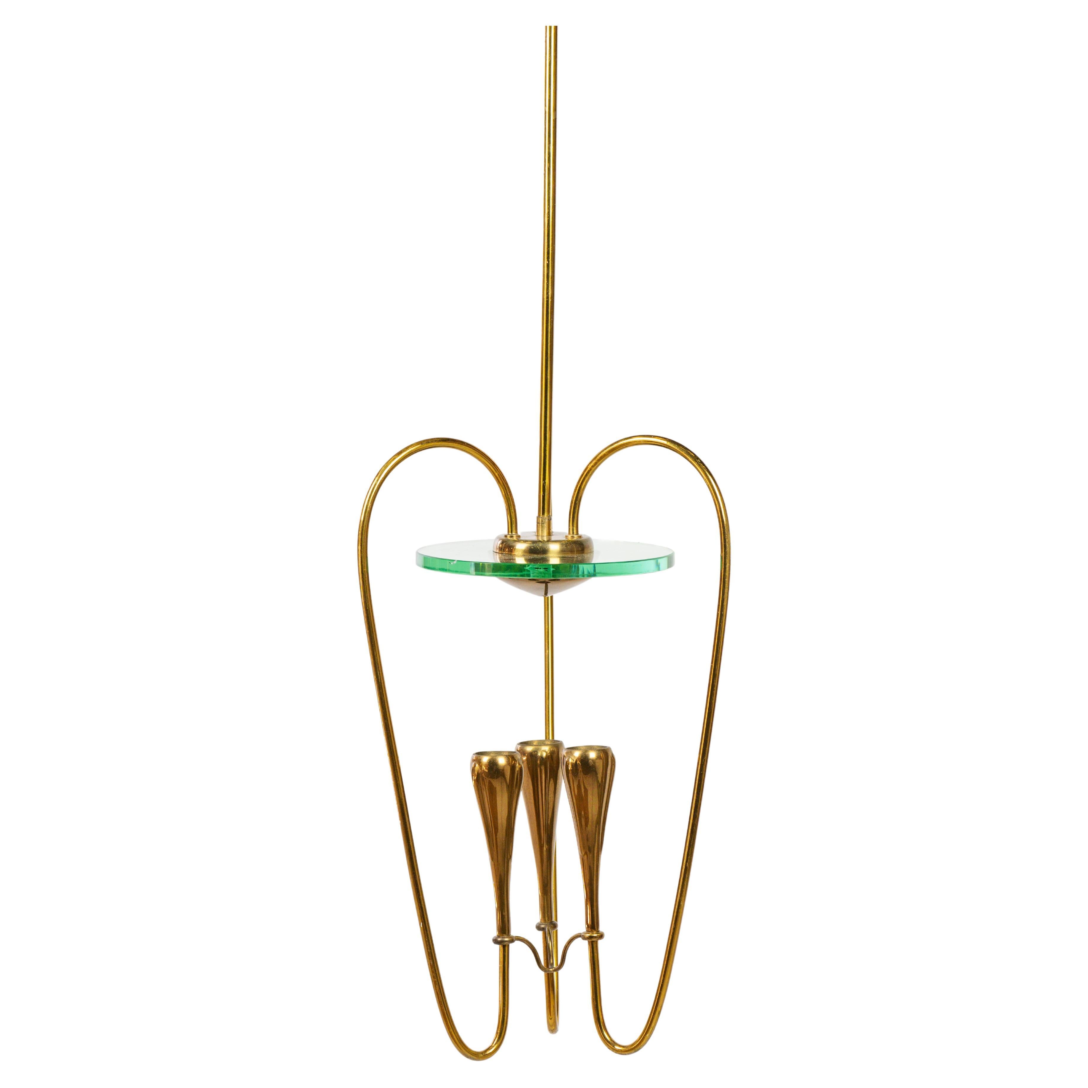 Lovely italian pendant light in brass and glass For Sale