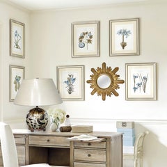 Ravissant miroir mural italien à étoiles ensoleillées et cadre doré, vers les années 1970.