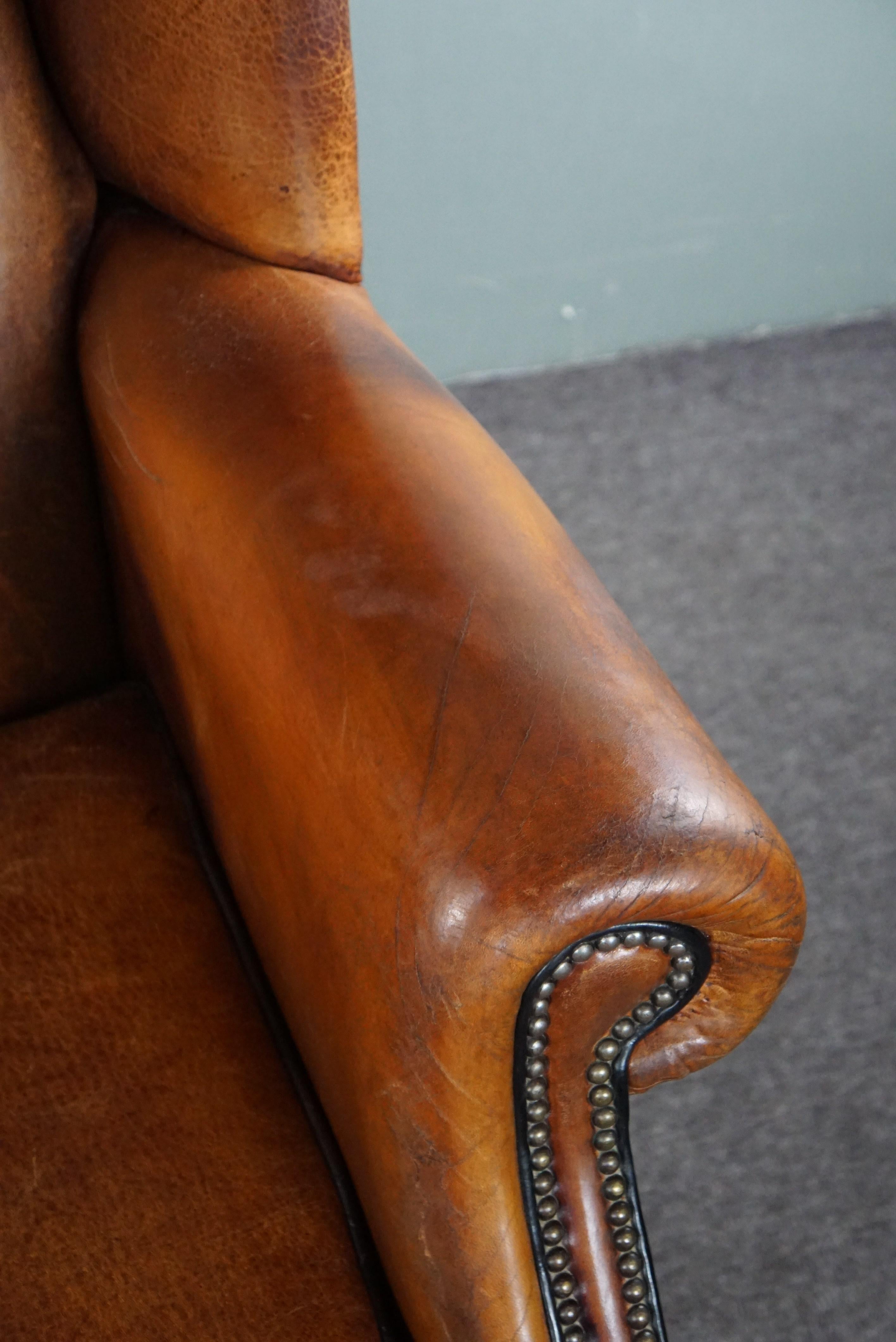 Lovely large sheepskin leather wingback armchair with very good seating comfort For Sale 2
