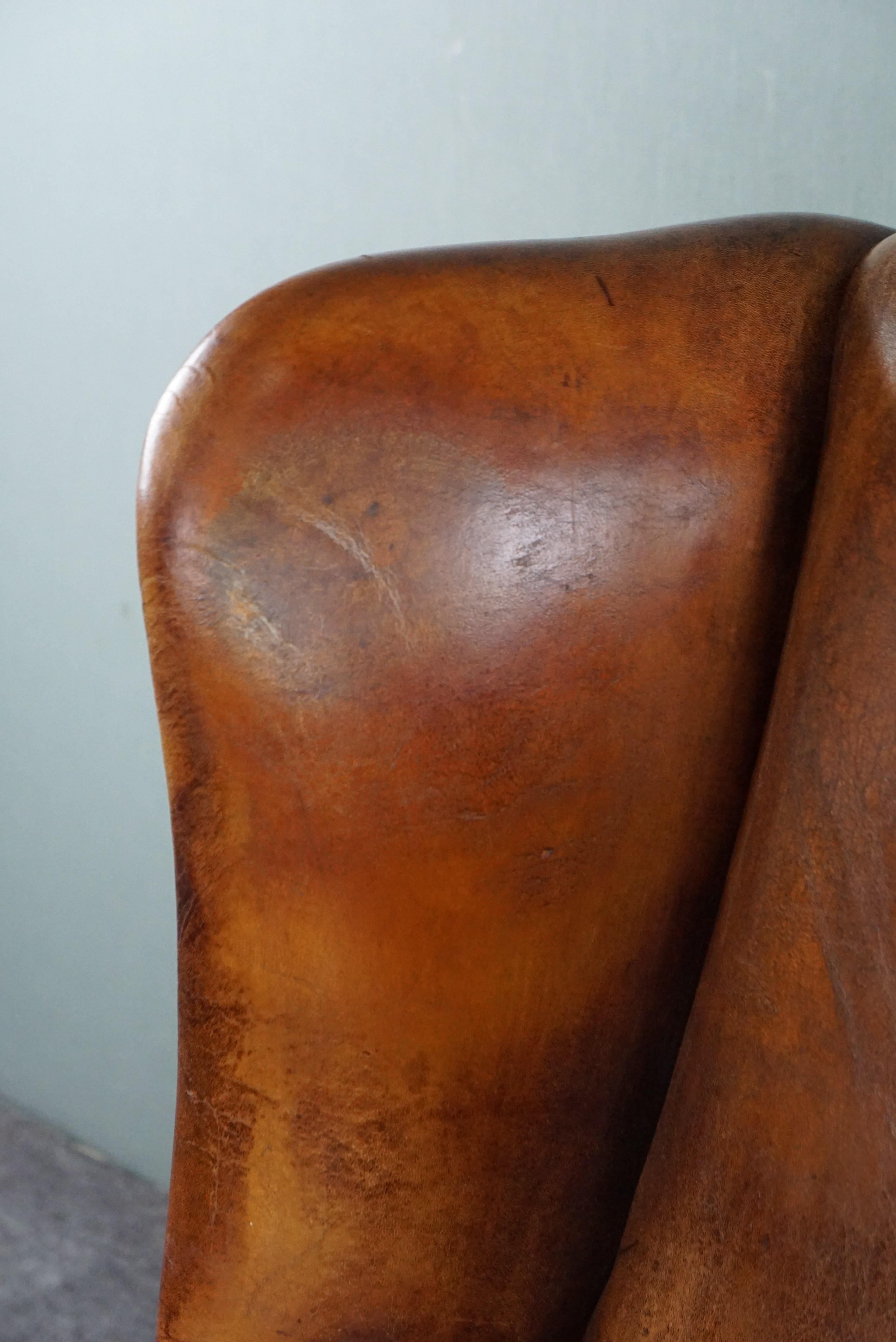 Lovely large sheepskin leather wingback armchair with very good seating comfort For Sale 3
