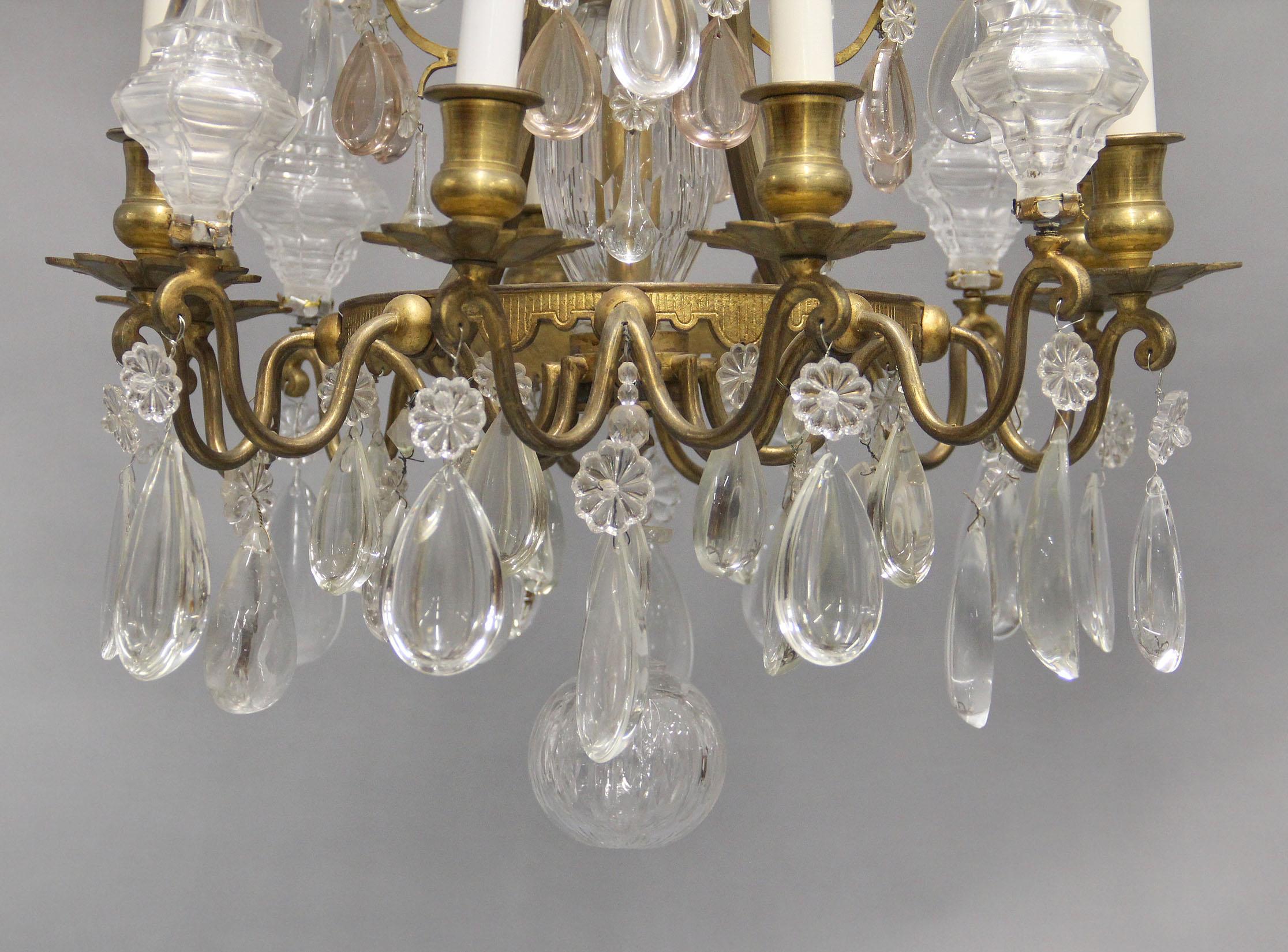 Lovely Late 19th Century Gilt Bronze and Crystal Eight Light Chandelier In Good Condition For Sale In Long Island City, NY