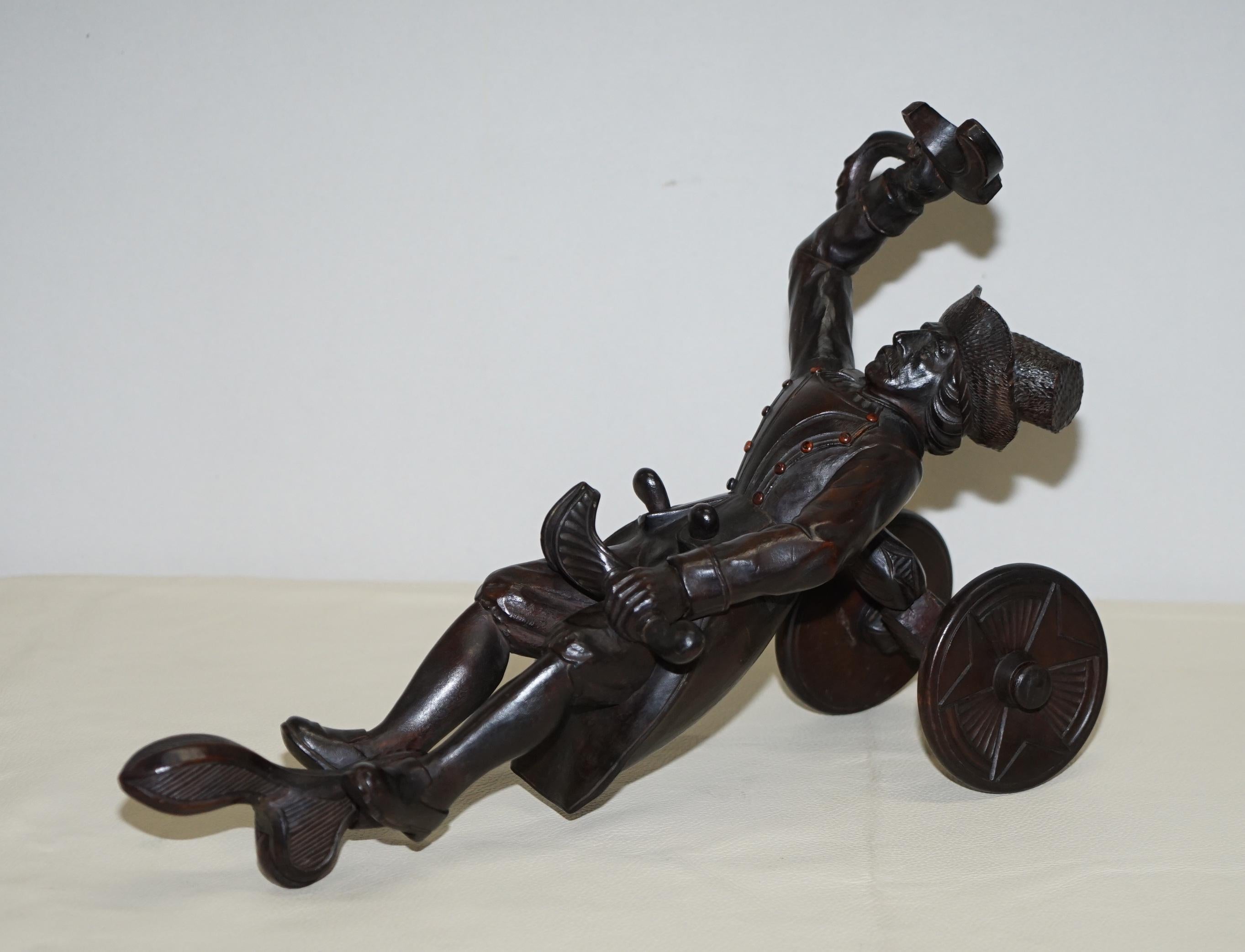 We are delighted to offer for sale this absolutely lovely original circa 1880 Black forest carved wine bottle holder

A very good looking and decorative piece of folk art from the black forest, its been made to hold a bottle of wine that you can
