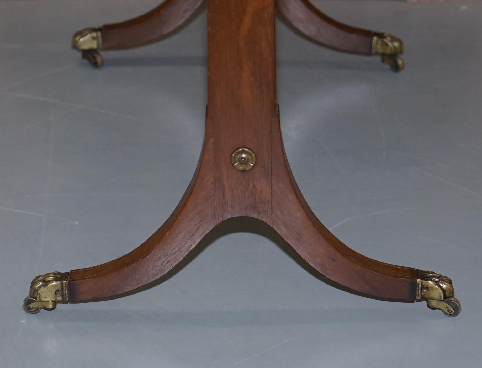 Lovely Light Mahogany with Oxblood Leather Top Coffee Table Lion Paw Castors 5