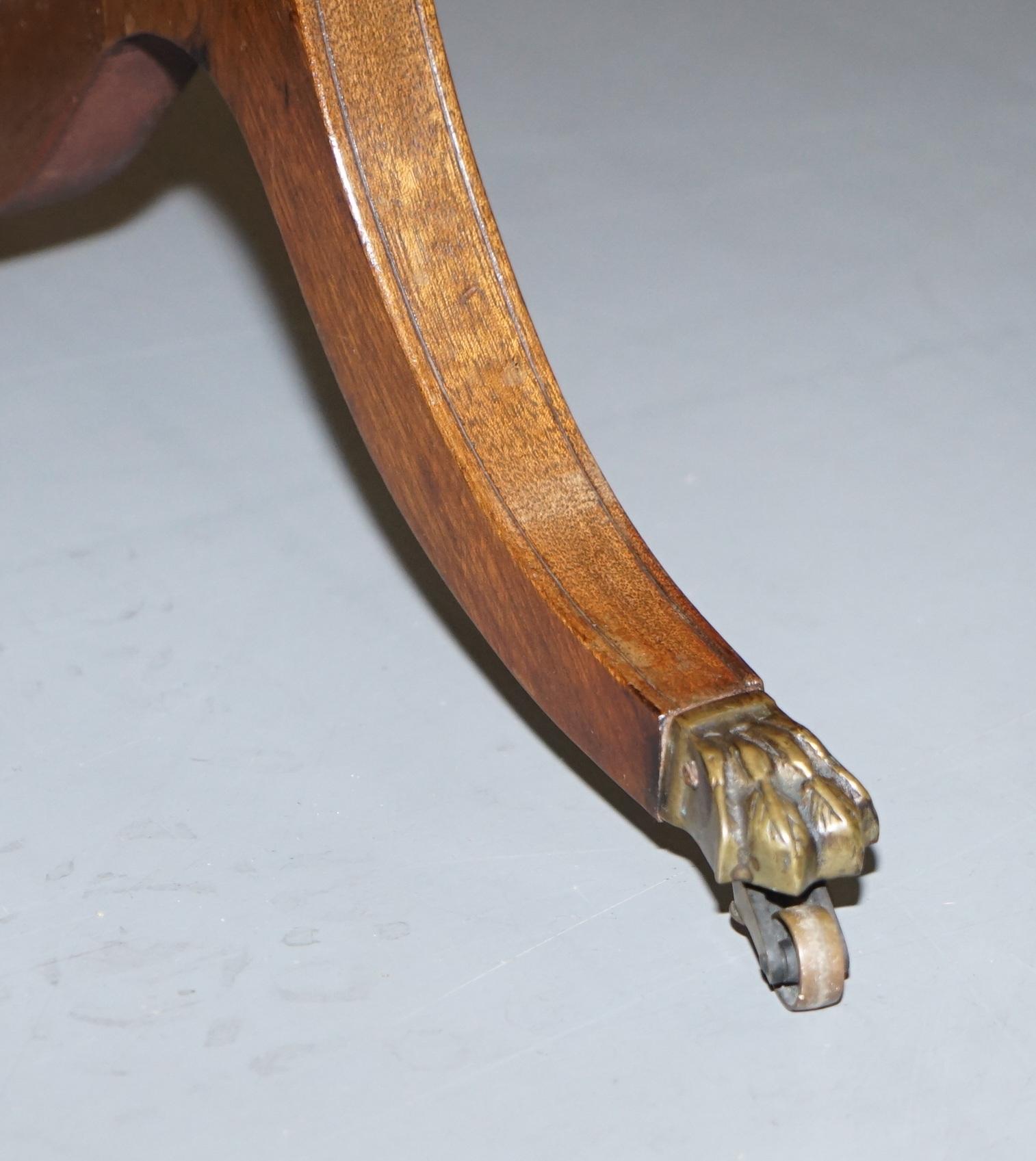 Lovely Light Mahogany with Oxblood Leather Top Coffee Table Lion Paw Castors 3