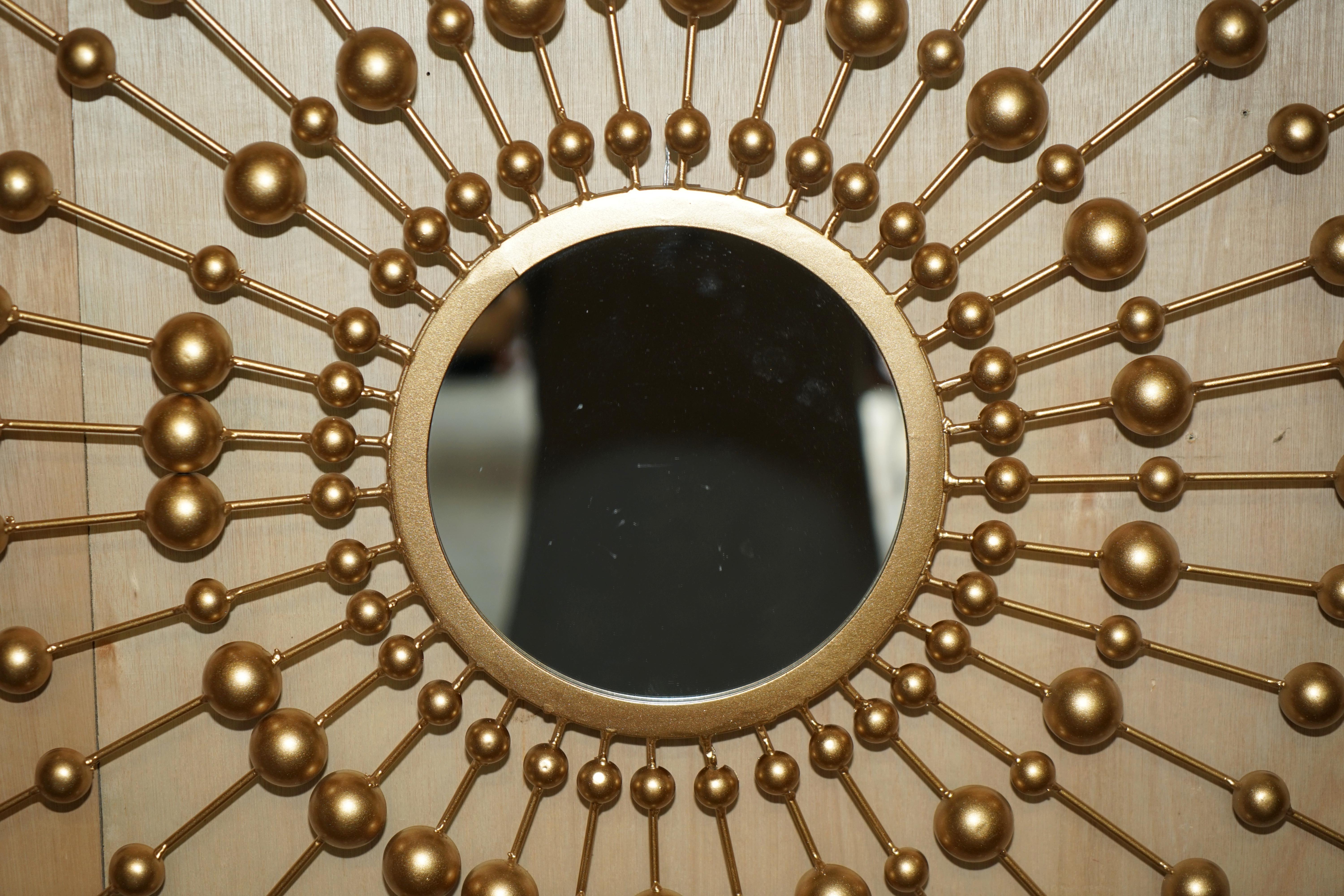 Royal House Antiques

Royal House Antiques is delighted to offer for sale this large decorative sun style mirror which has one small central mirror that is surrounded by 36 smaller mirrors

Please note the delivery fee listed is just a guide, it