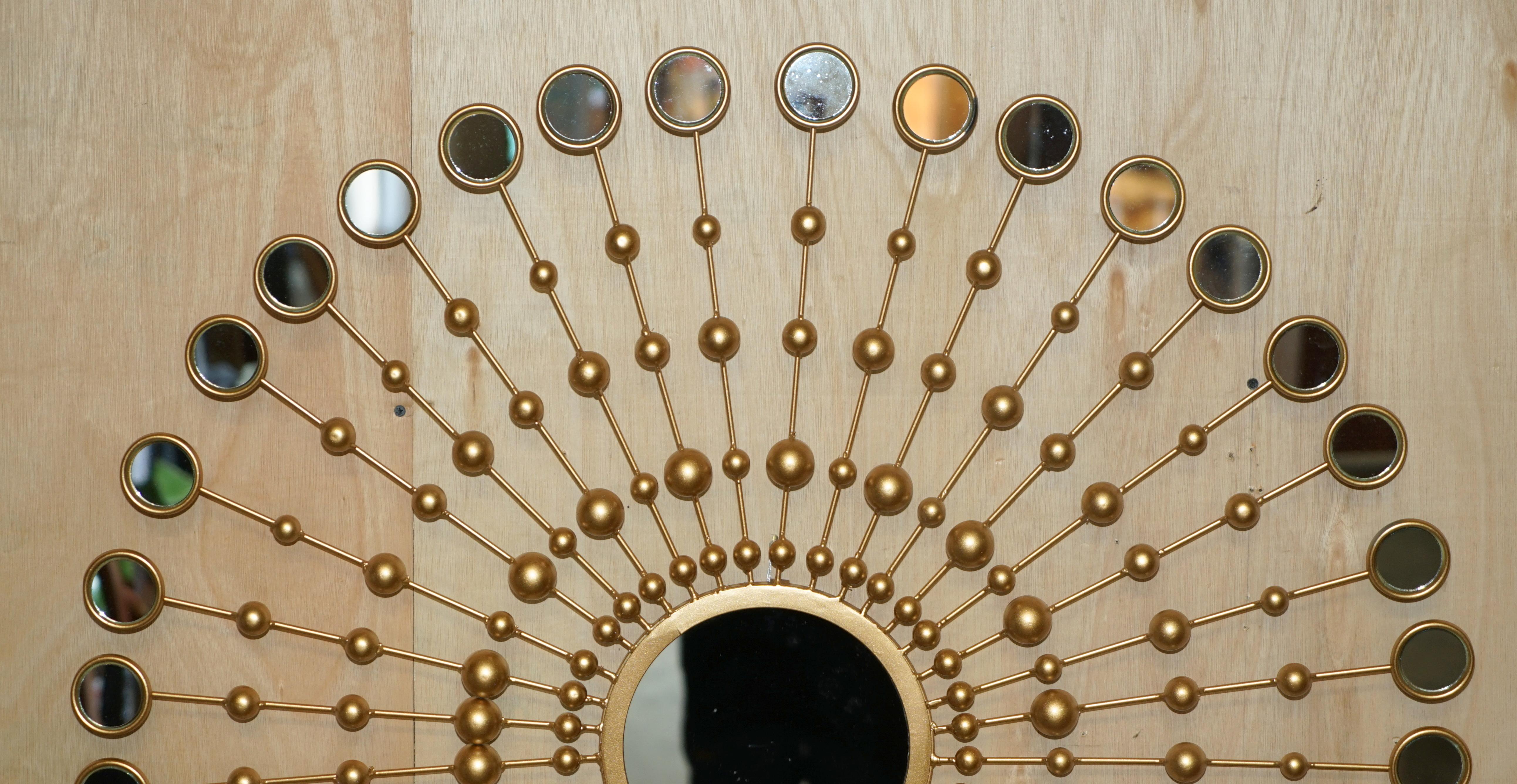 Mid-Century Modern LOVELY LOOKiNG DECORATIVE LARGE WALL MIRROR WITH 36 SMALL MIRRORS IN A SUN FORM For Sale