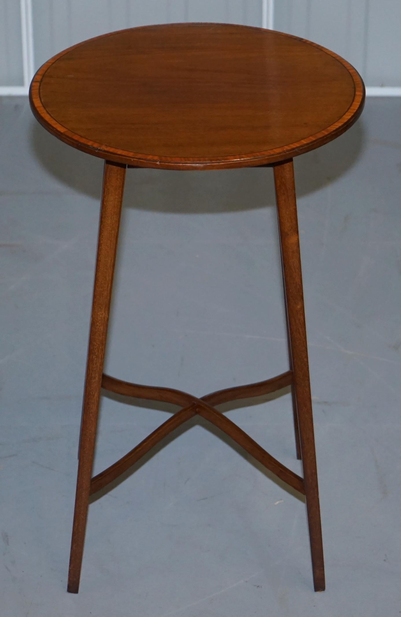 We are delighted to this absolutely stunning vintage flamed mahogany round side table

A very well made and decorative piece, the timber patina is sublime as are the sculpted stretches

We have cleaned waxed and polished it from top to bottom,